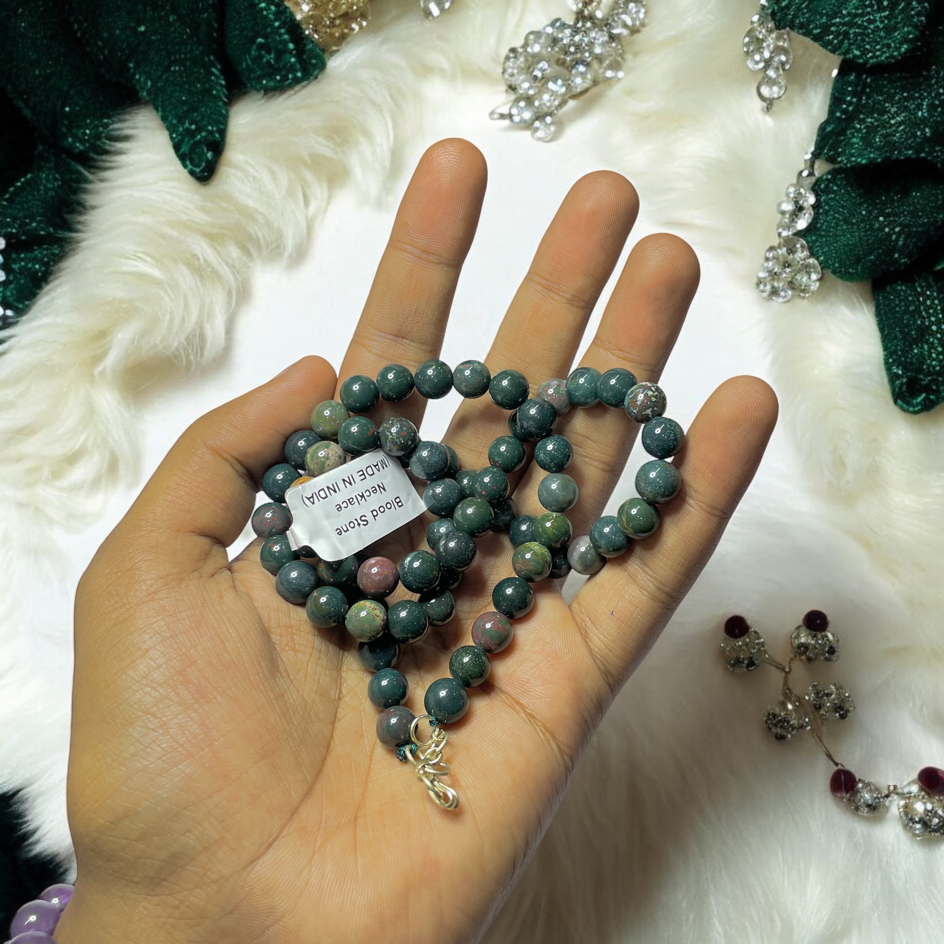 Blood Stone Crystal Necklace. Discover the Power of Natural Crystals with Rocksmins: Elegantly Crafted Crystal Necklaces Infused with Authentic Energies for Enhanced Well-Being and Spiritual Growth