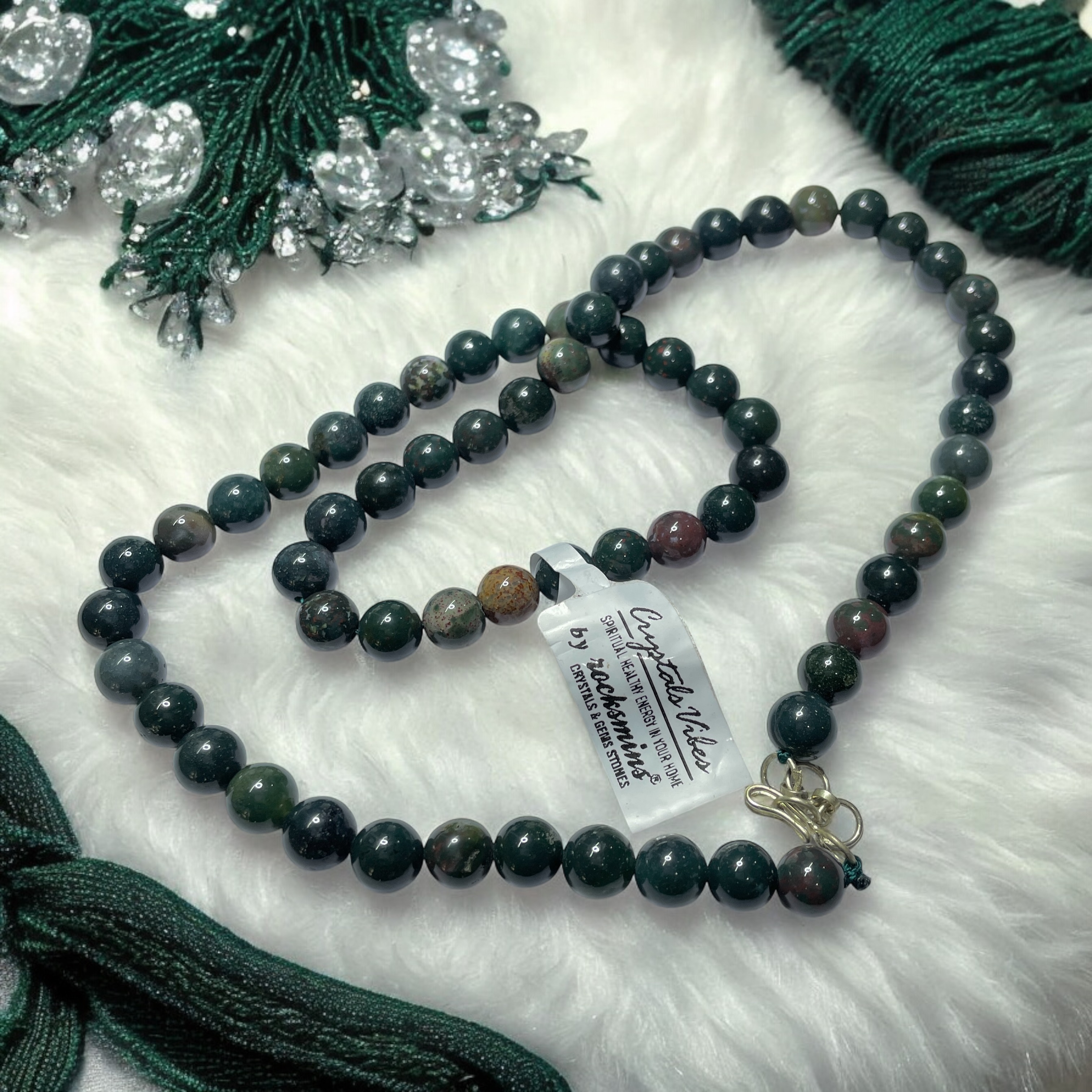 Blood Stone Crystal Necklace. Discover the Power of Natural Crystals with Rocksmins: Elegantly Crafted Crystal Necklaces Infused with Authentic Energies for Enhanced Well-Being and Spiritual Growth