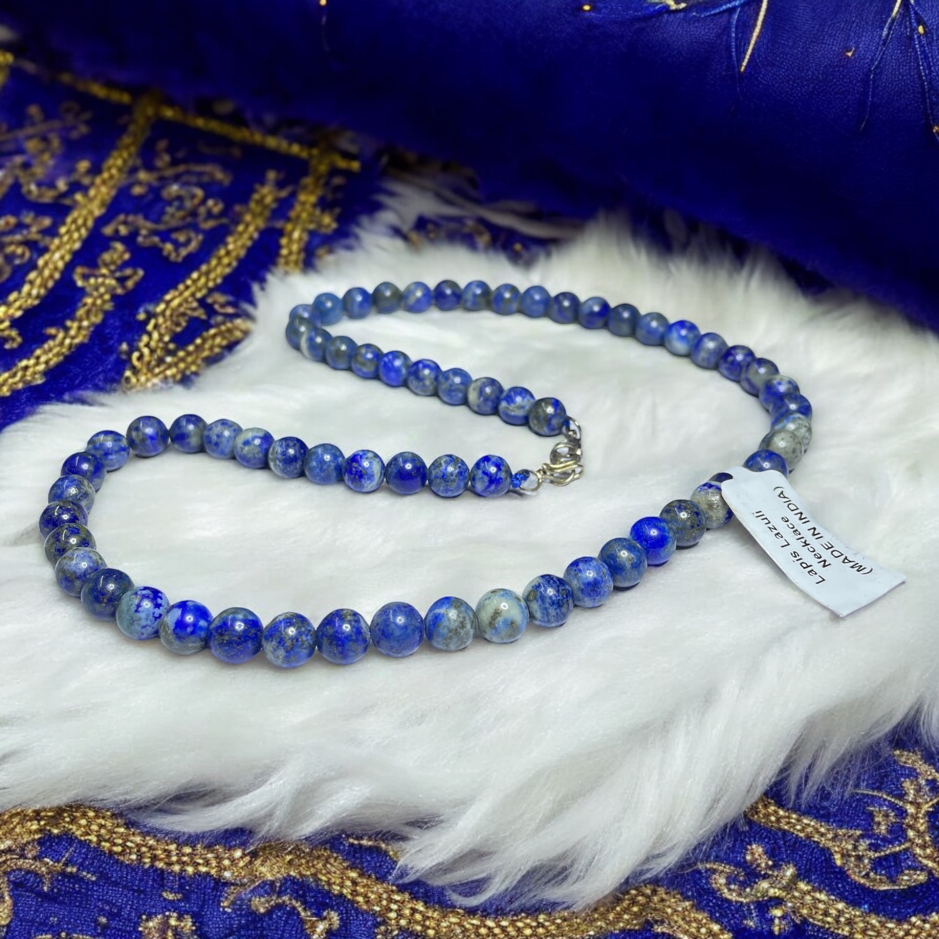 Lapis Lazuli Crystal Necklace. Discover the Power of Natural Crystals with Rocksmins: Elegantly Crafted Crystal Necklaces Infused with Authentic Energies for Enhanced Well-Being and Spiritual Growth