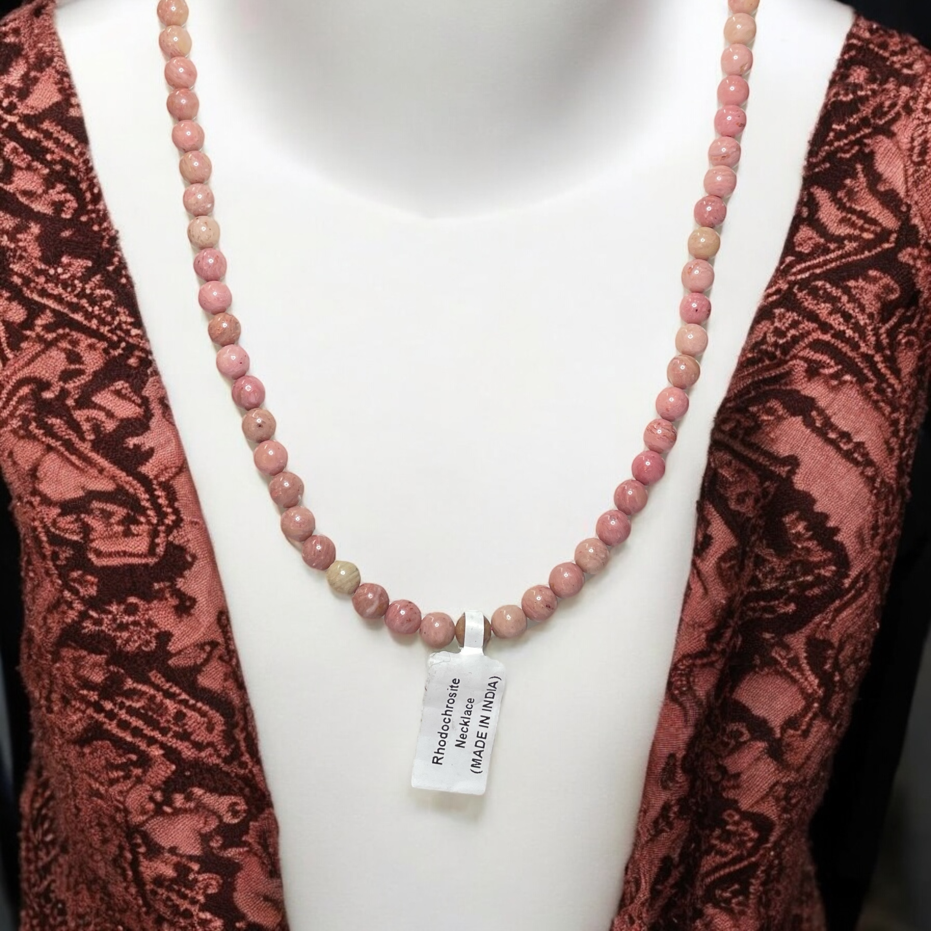 rhodochrosite-crystal-necklace-discover-the-power-of-natural-crystals-with-rocksmins-elegantly-crafted-crystal-necklaces-infused-with-authentic-energies-for-enhanced-well-being-and-spiritual-growth