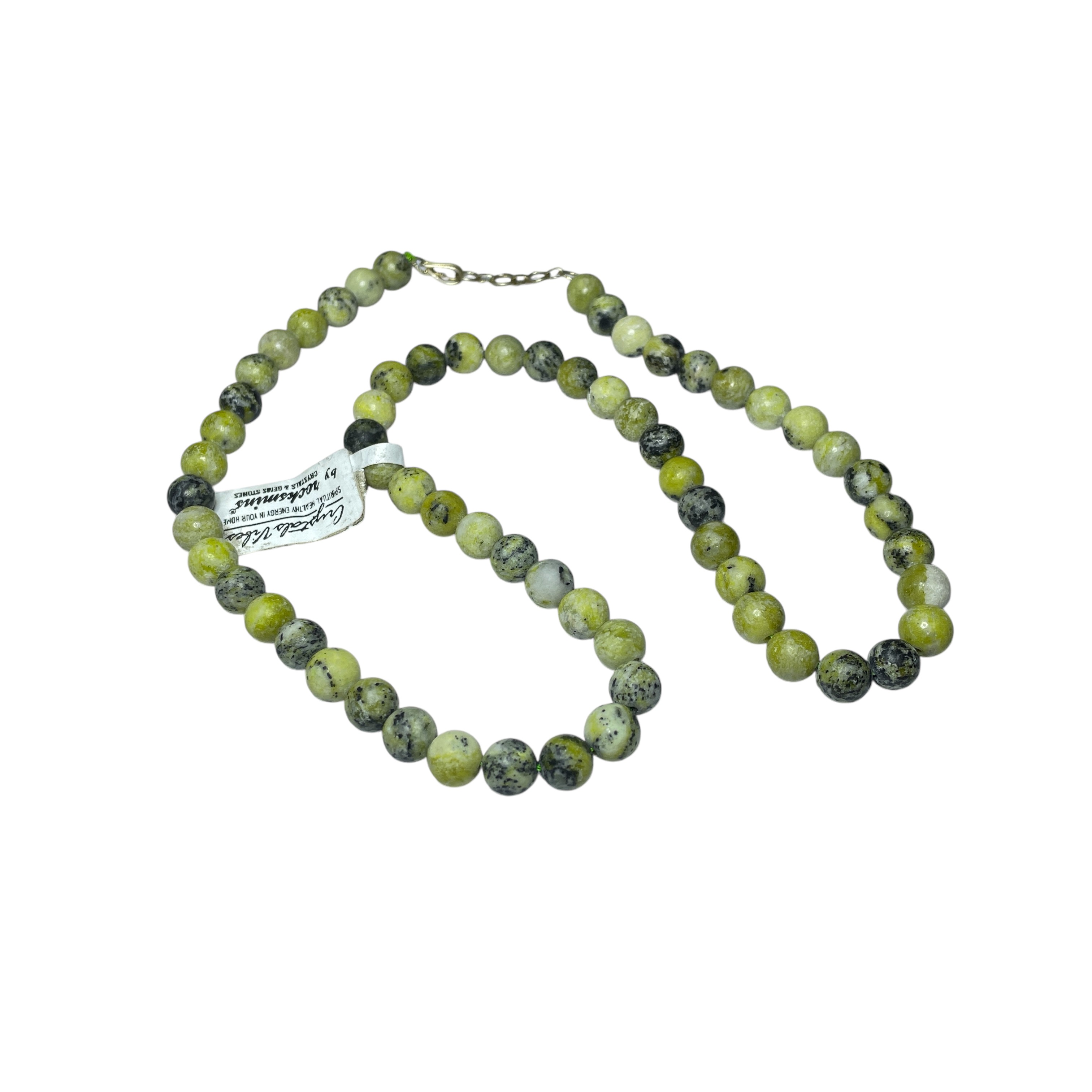 Serpentine Crystal Necklace. Discover the Power of Natural Crystals with Rocksmins: Elegantly Crafted Crystal Necklaces Infused with Authentic Energies for Enhanced Well-Being and Spiritual Growth