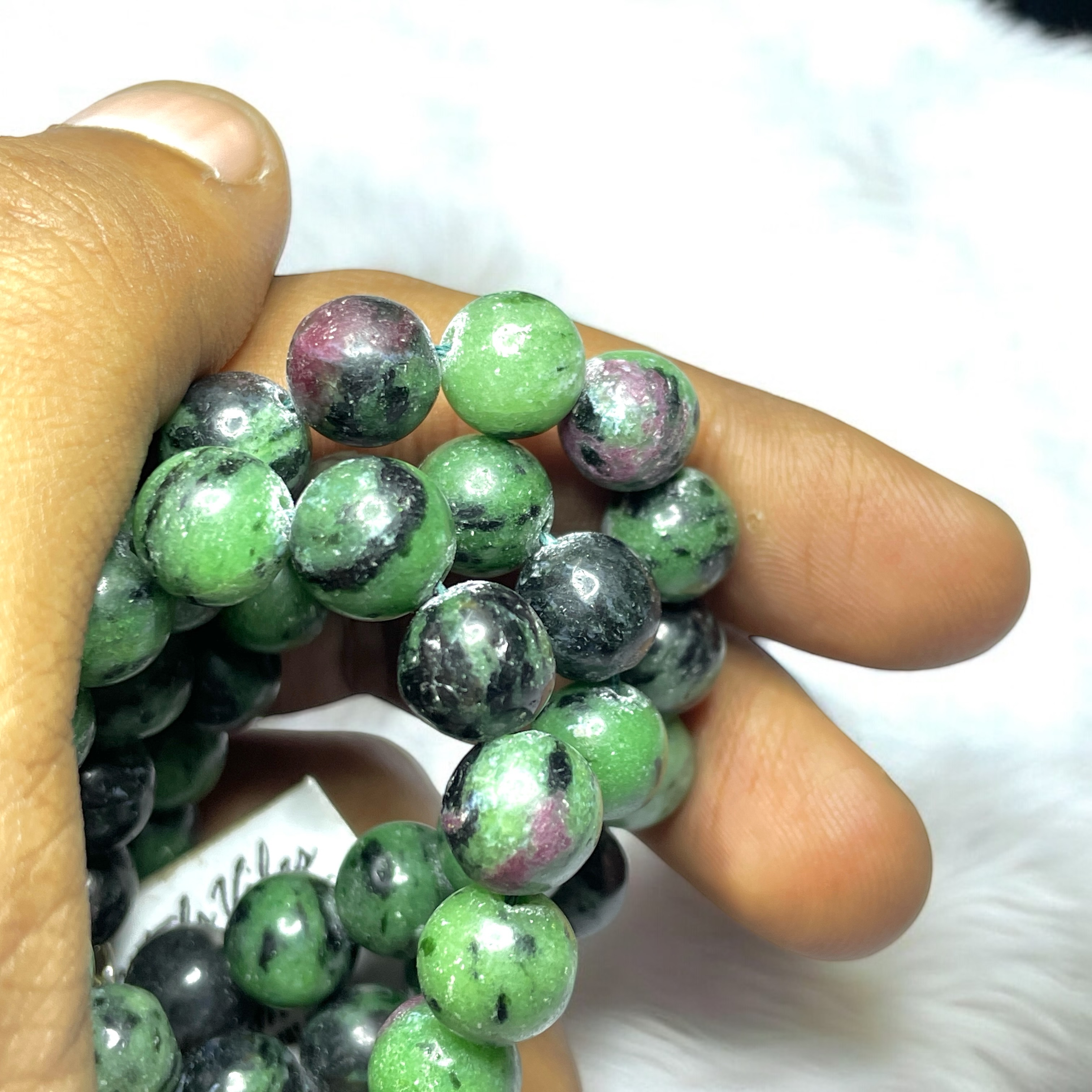 Ruby Zoisite Crystal Necklace. Discover the Power of Natural Crystals with Rocksmins: Elegantly Crafted Crystal Necklaces Infused with Authentic Energies for Enhanced Well-Being and Spiritual Growth