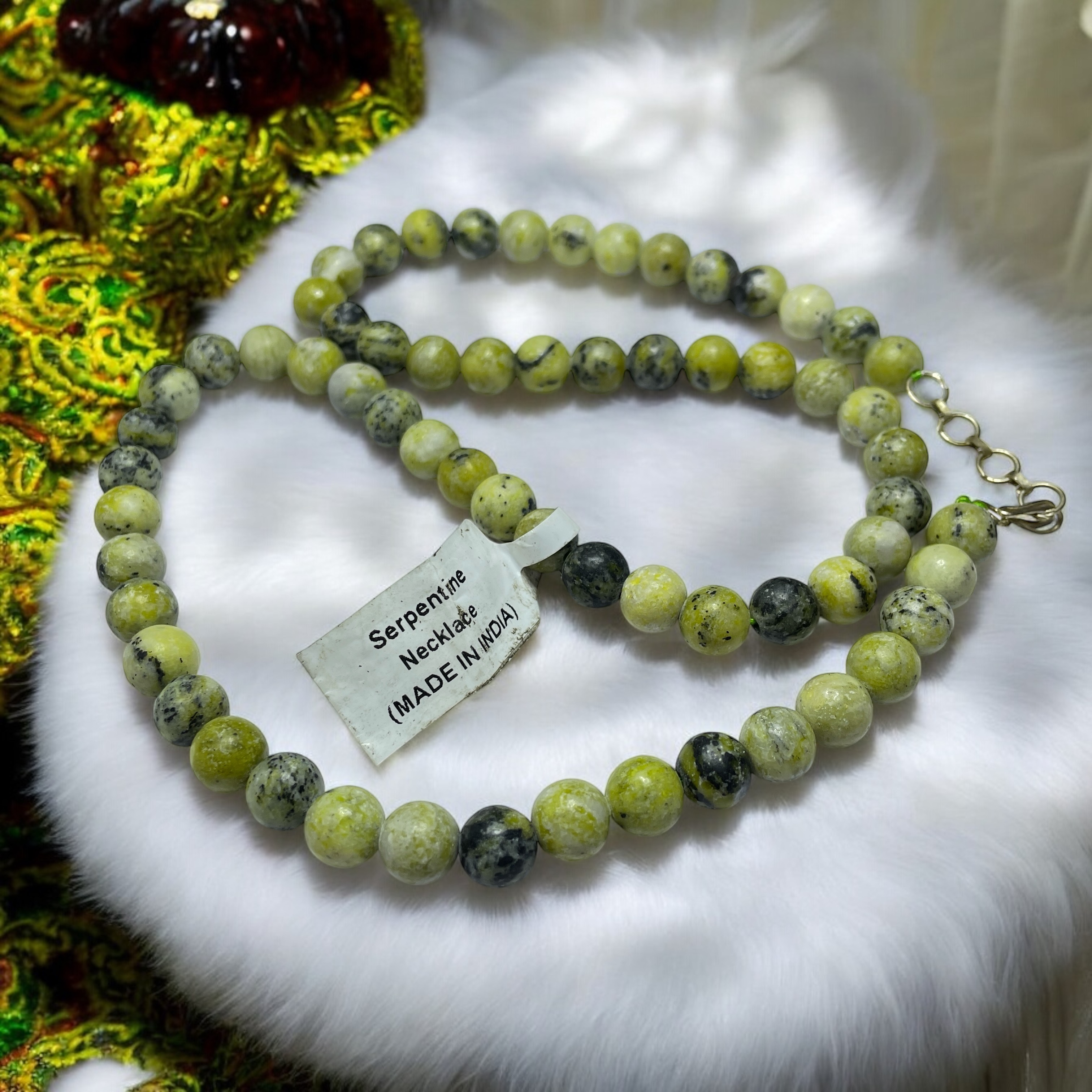 Serpentine Crystal Necklace. Discover the Power of Natural Crystals with Rocksmins: Elegantly Crafted Crystal Necklaces Infused with Authentic Energies for Enhanced Well-Being and Spiritual Growth