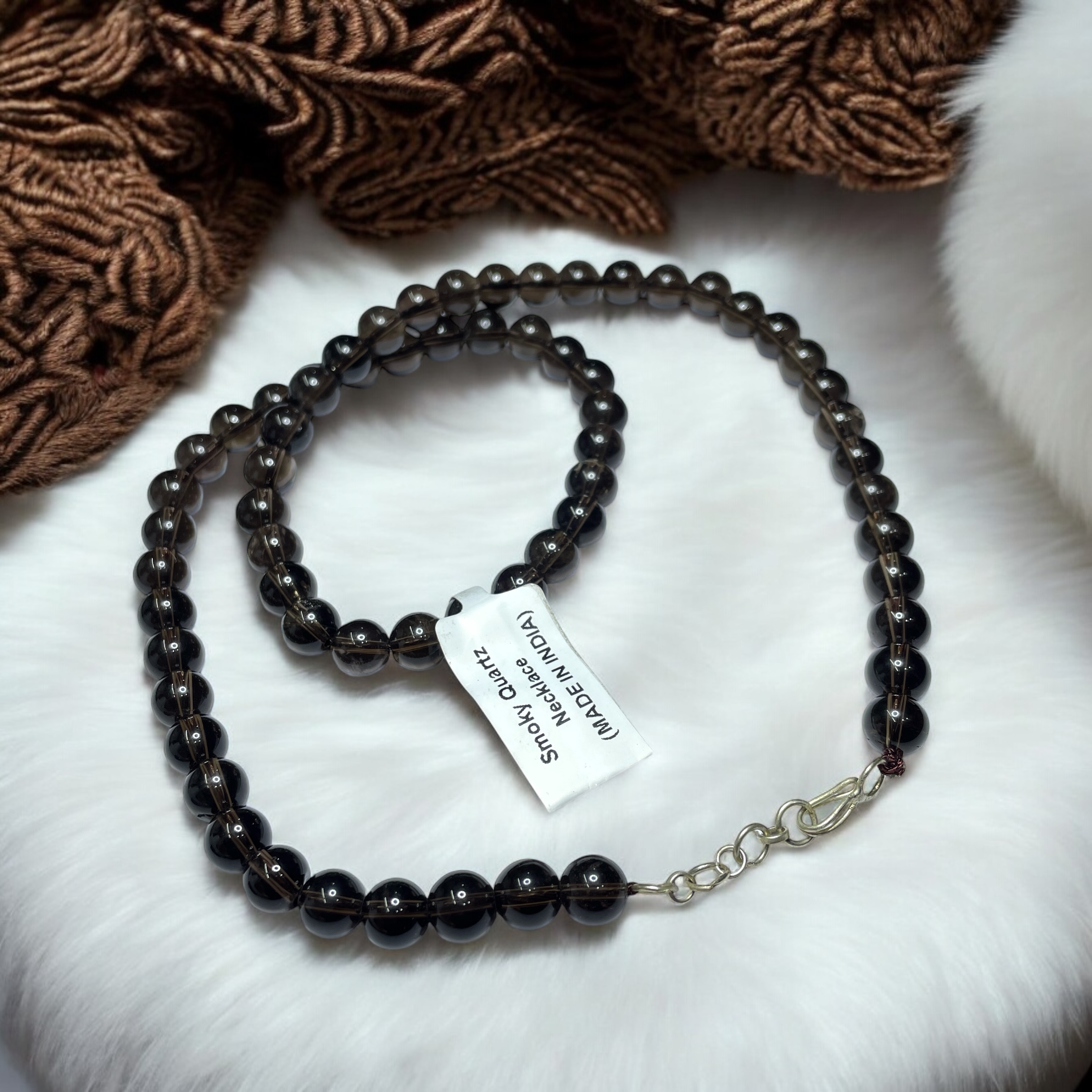 Smoky Quartz Crystal Necklace. Discover the Power of Natural Crystals with Rocksmins: Elegantly Crafted Crystal Necklaces Infused with Authentic Energies for Enhanced Well-Being and Spiritual Growth