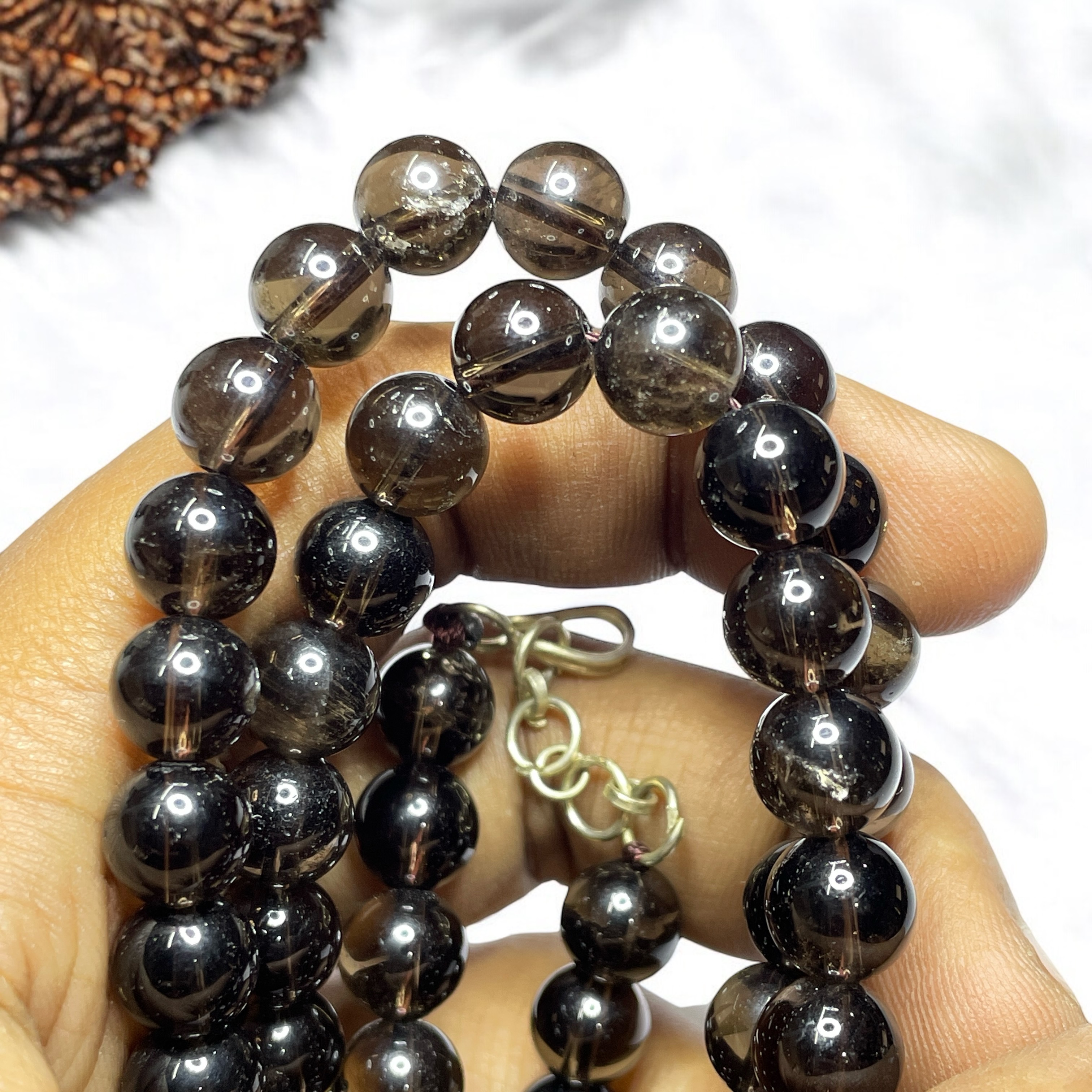 Smoky Quartz Crystal Necklace. Discover the Power of Natural Crystals with Rocksmins: Elegantly Crafted Crystal Necklaces Infused with Authentic Energies for Enhanced Well-Being and Spiritual Growth