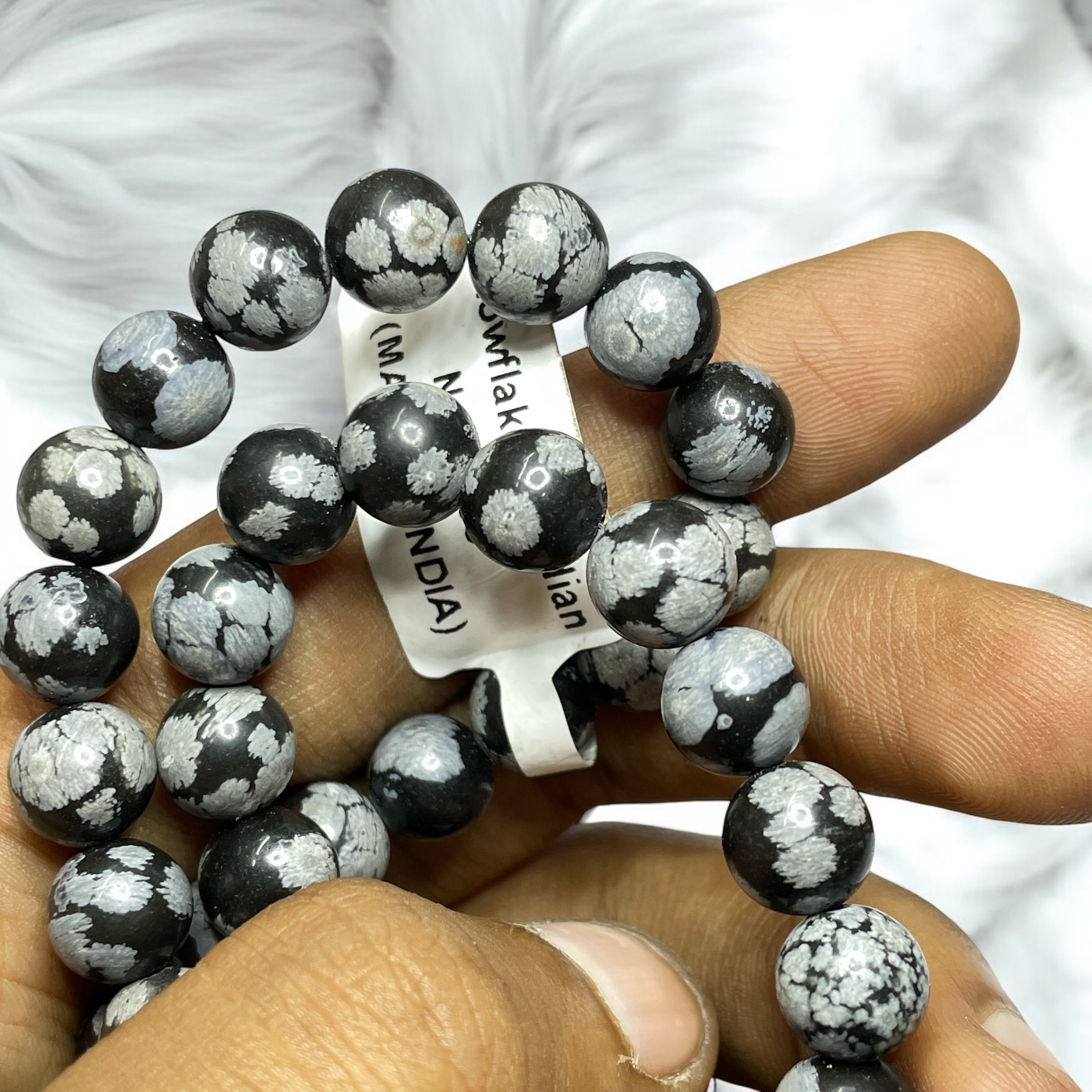 Snowflake Obsidian Crystal Necklace. Discover the Power of Natural Crystals with Rocksmins: Elegantly Crafted Crystal Necklaces Infused with Authentic Energies for Enhanced Well-Being and Spiritual Growth