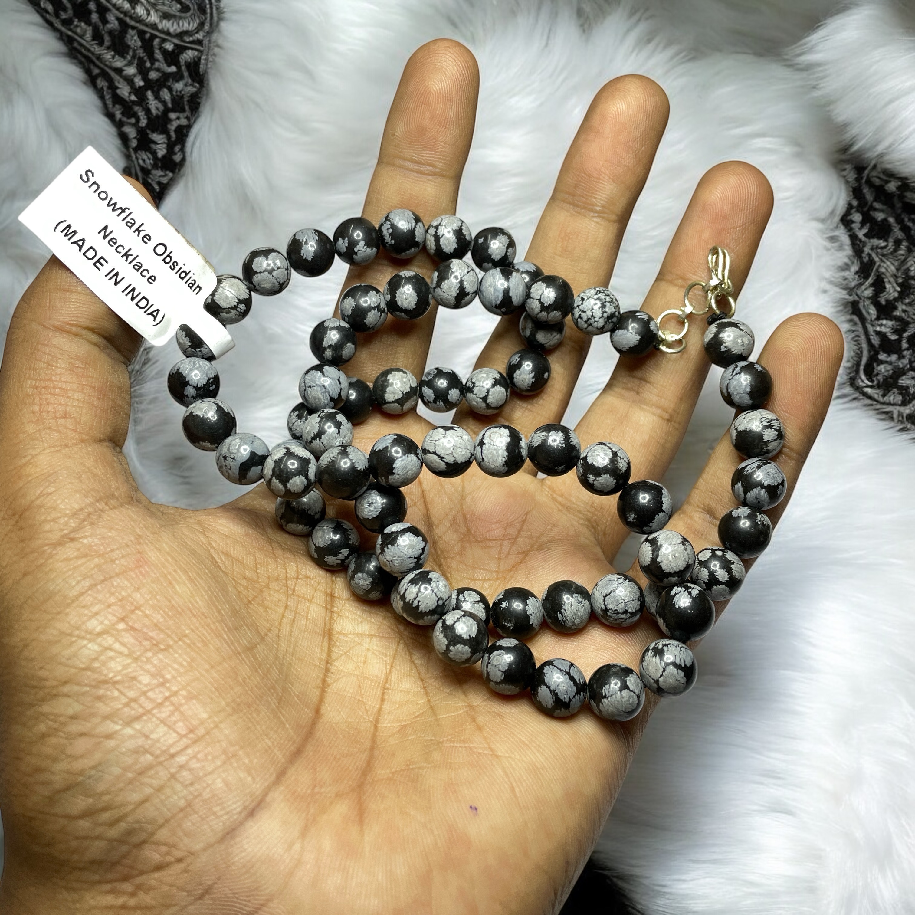 Snowflake Obsidian Crystal Necklace. Discover the Power of Natural Crystals with Rocksmins: Elegantly Crafted Crystal Necklaces Infused with Authentic Energies for Enhanced Well-Being and Spiritual Growth
