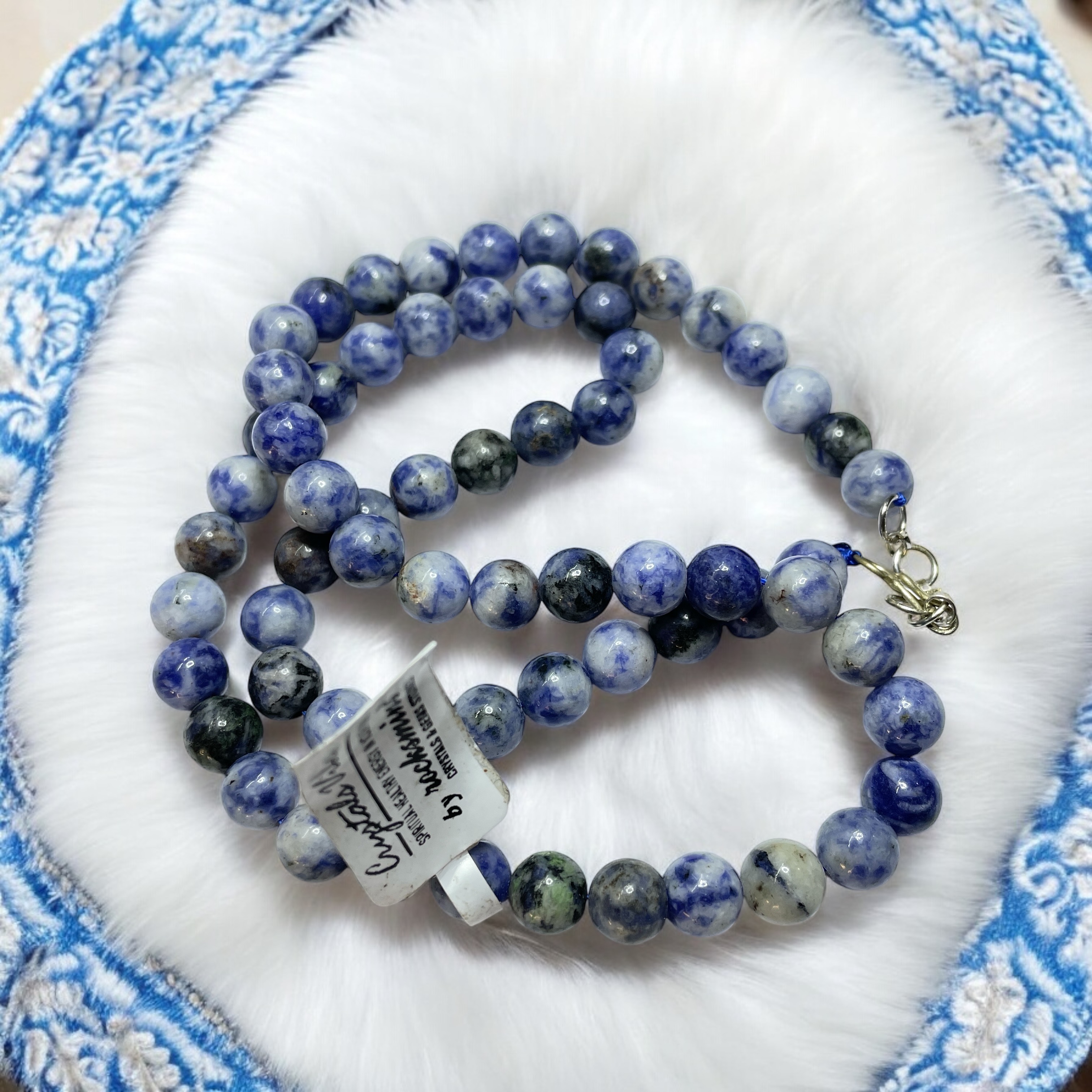 Sodalite Crystal Necklace. Discover the Power of Natural Crystals with Rocksmins: Elegantly Crafted Crystal Necklaces Infused with Authentic Energies for Enhanced Well-Being and Spiritual Growth