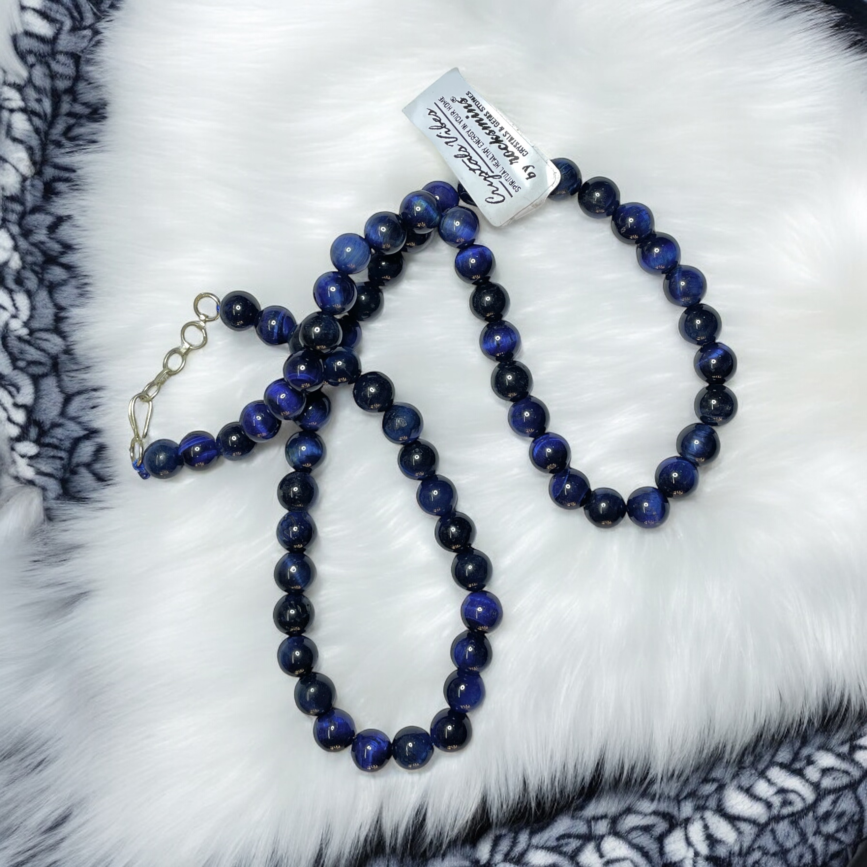 Tiger's Eye Blue Crystal Necklace. Discover the Power of Natural Crystals with Rocksmins: Elegantly Crafted Crystal Necklaces Infused with Authentic Energies for Enhanced Well-Being and Spiritual Growth