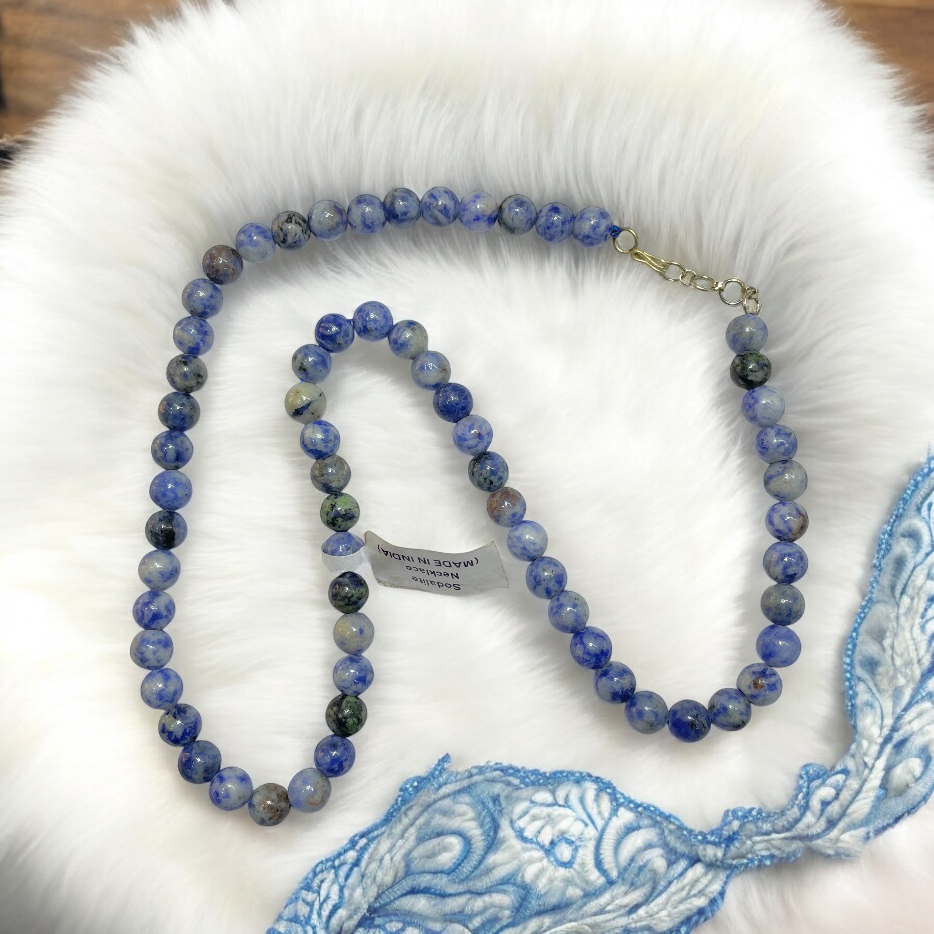Sodalite Crystal Necklace. Discover the Power of Natural Crystals with Rocksmins: Elegantly Crafted Crystal Necklaces Infused with Authentic Energies for Enhanced Well-Being and Spiritual Growth