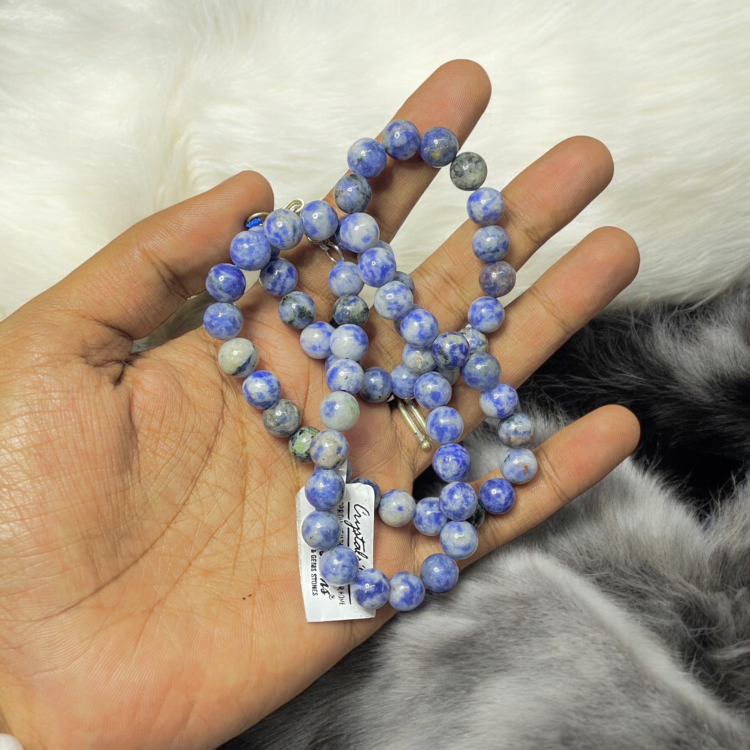 Sodalite Crystal Necklace. Discover the Power of Natural Crystals with Rocksmins: Elegantly Crafted Crystal Necklaces Infused with Authentic Energies for Enhanced Well-Being and Spiritual Growth