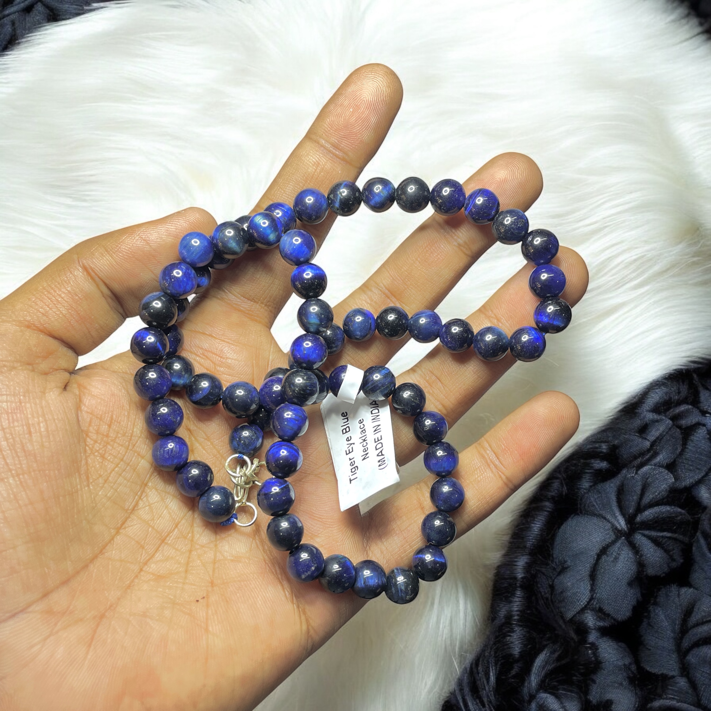 Tiger's Eye Blue Crystal Necklace. Discover the Power of Natural Crystals with Rocksmins: Elegantly Crafted Crystal Necklaces Infused with Authentic Energies for Enhanced Well-Being and Spiritual Growth