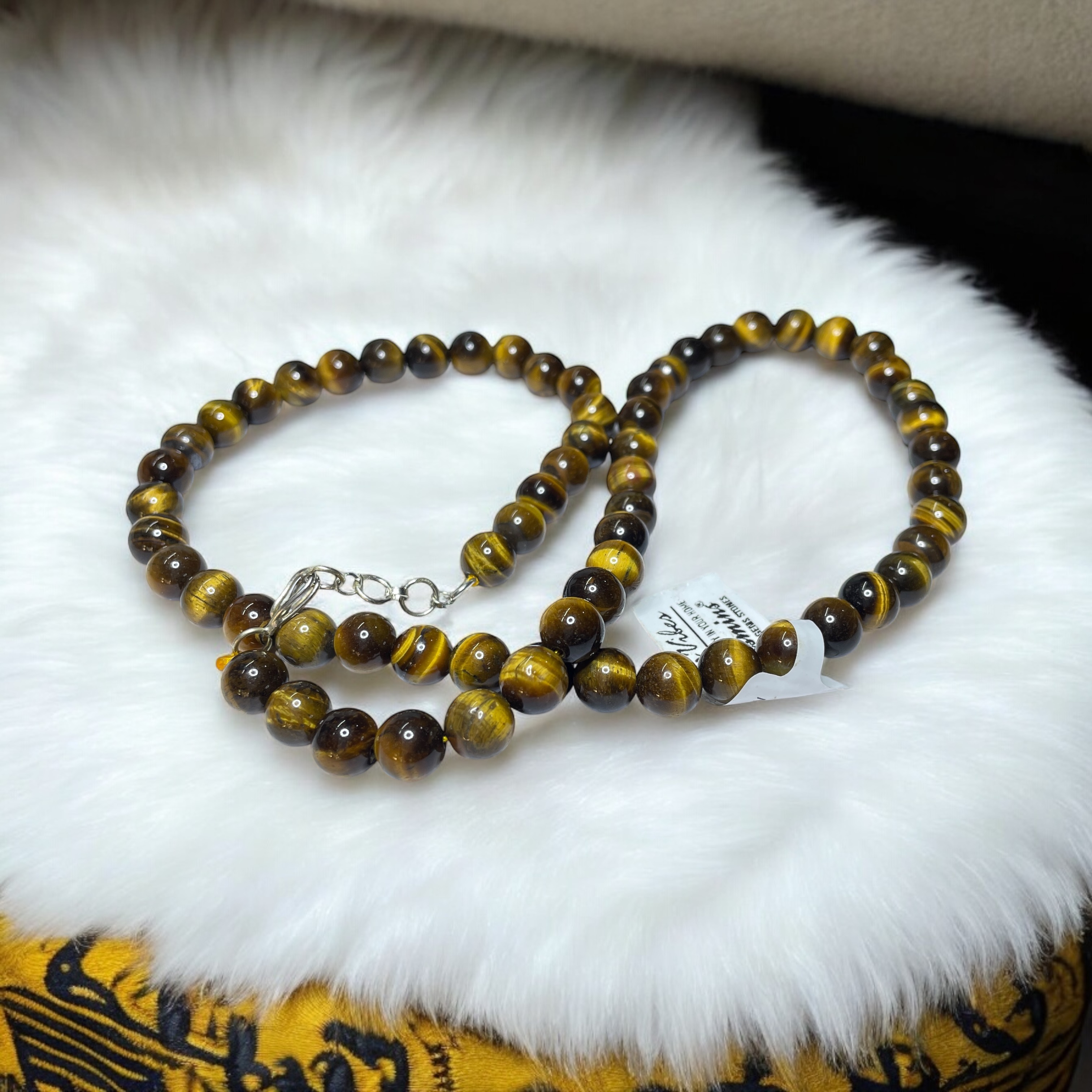 Tiger's Eye Yellow Crystal Necklace. Discover the Power of Natural Crystals with Rocksmins: Elegantly Crafted Crystal Necklaces Infused with Authentic Energies for Enhanced Well-Being and Spiritual Growth