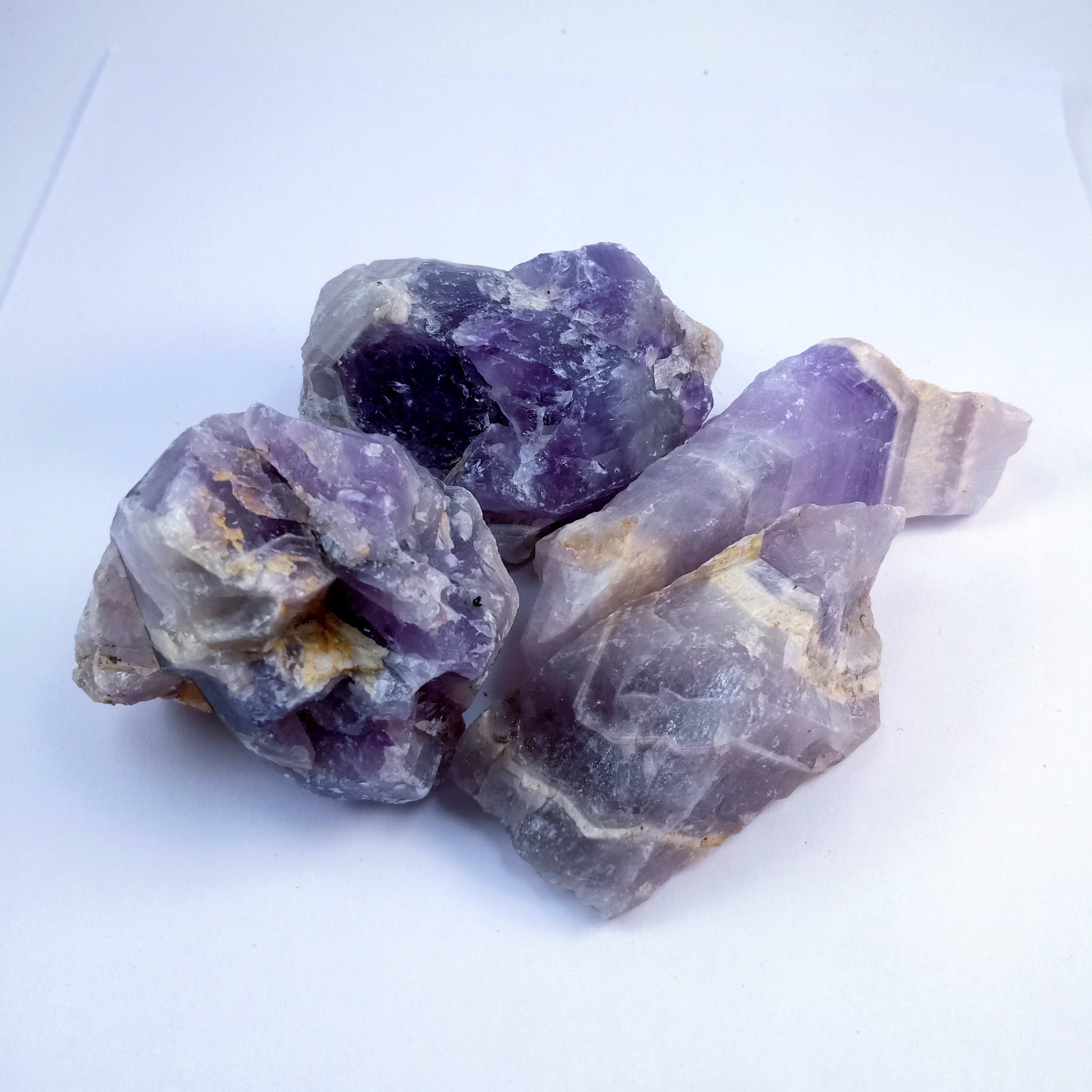 Amethyst light Natural Rough Stone 100gm+ For Reiki, Healing Aura Cleaning, Tumbling, Vastu, Meditation, Gardening, Decoration & Remove Negative Energy (Raw)   Brand : Rocksmins