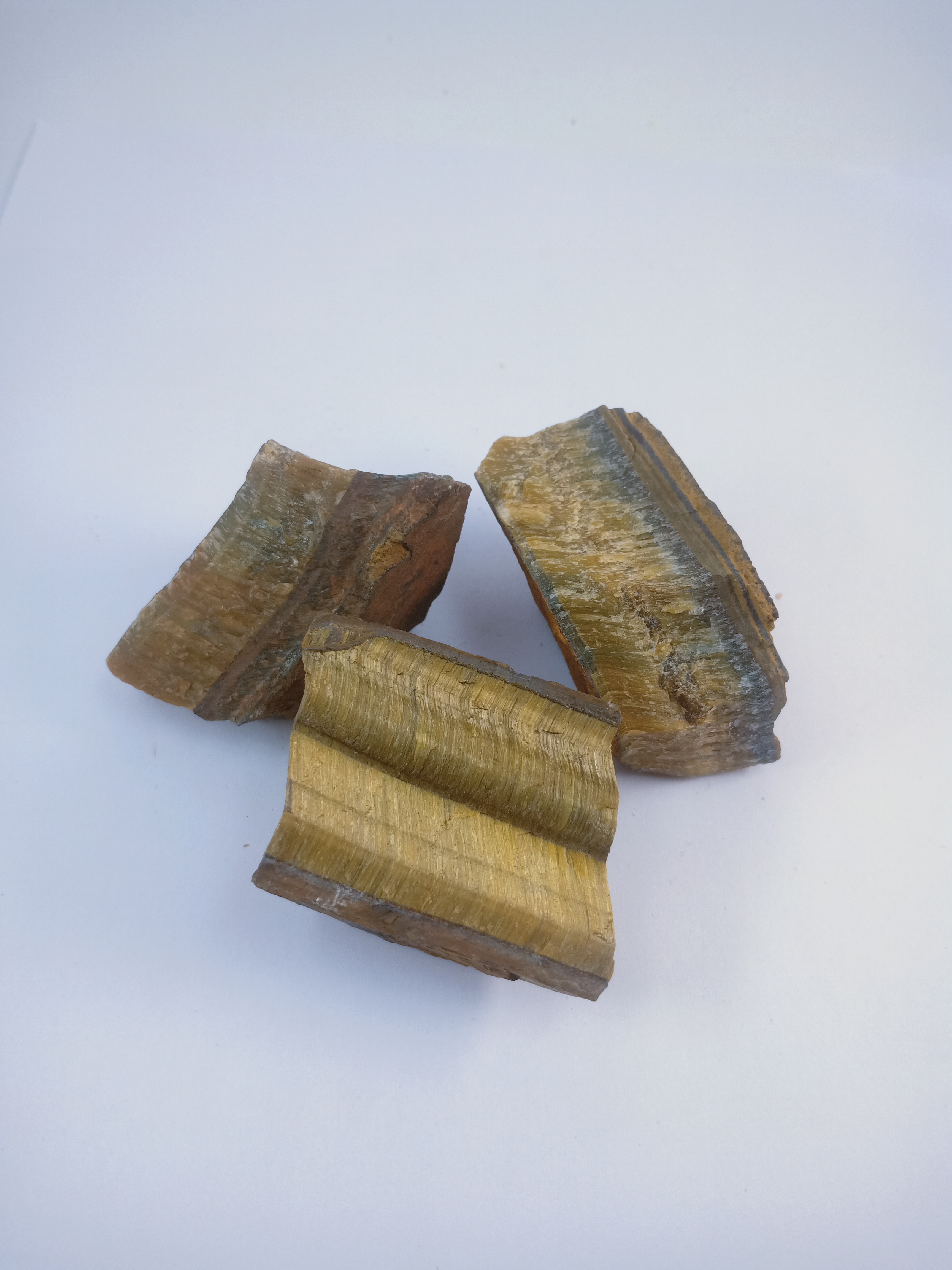 Tigers Eye Natural Rough Stone 100gm+ For Reiki, Healing Aura Cleaning, Tumbling, Vastu, Meditation, Gardening, Decoration & Remove Negative Energy (Raw)   Brand : Rocksmins