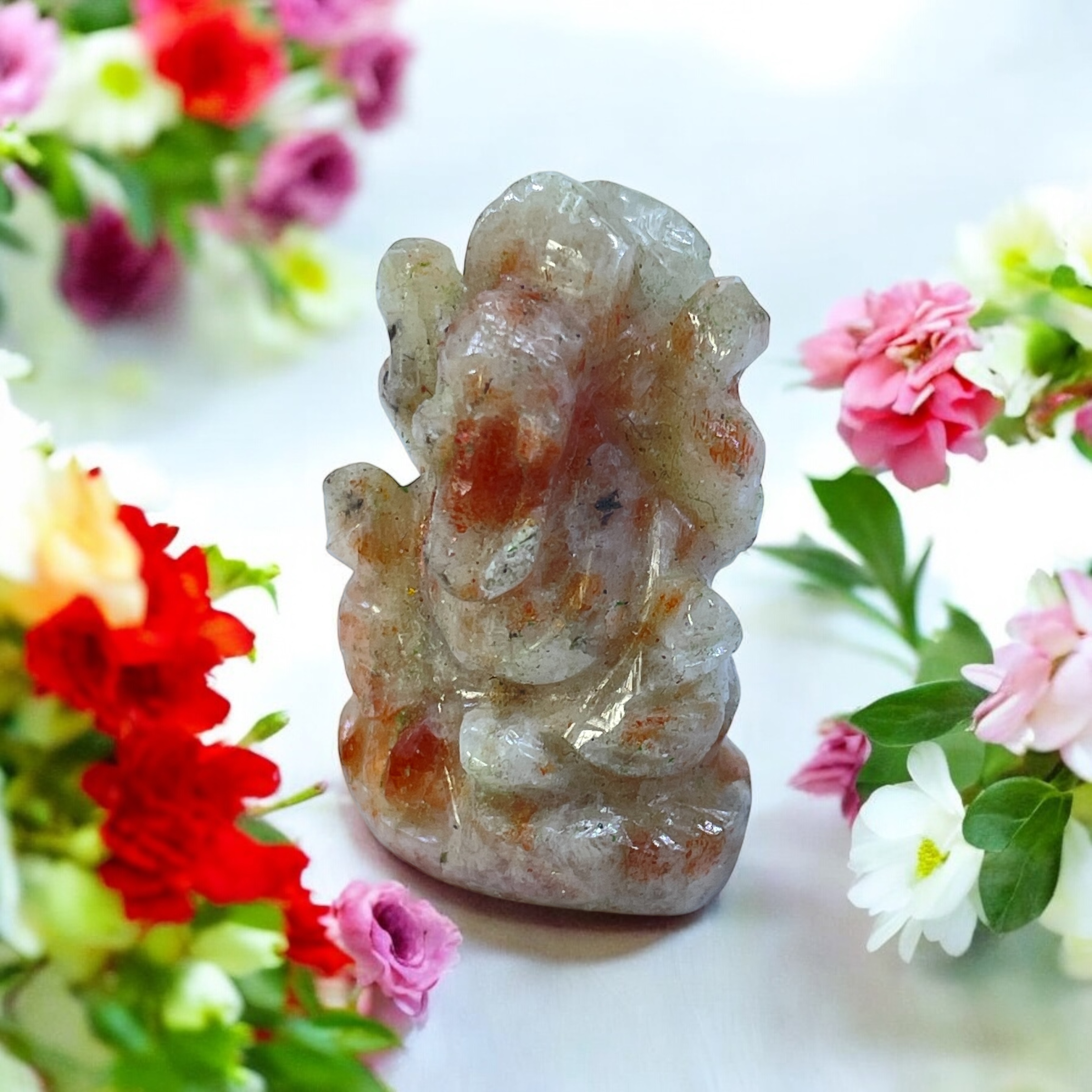 sunstone-1-inch-natural-crystal-ganesh-idol--pocket-figurine-for-healing-meditation--chakra-balance--rocksmins