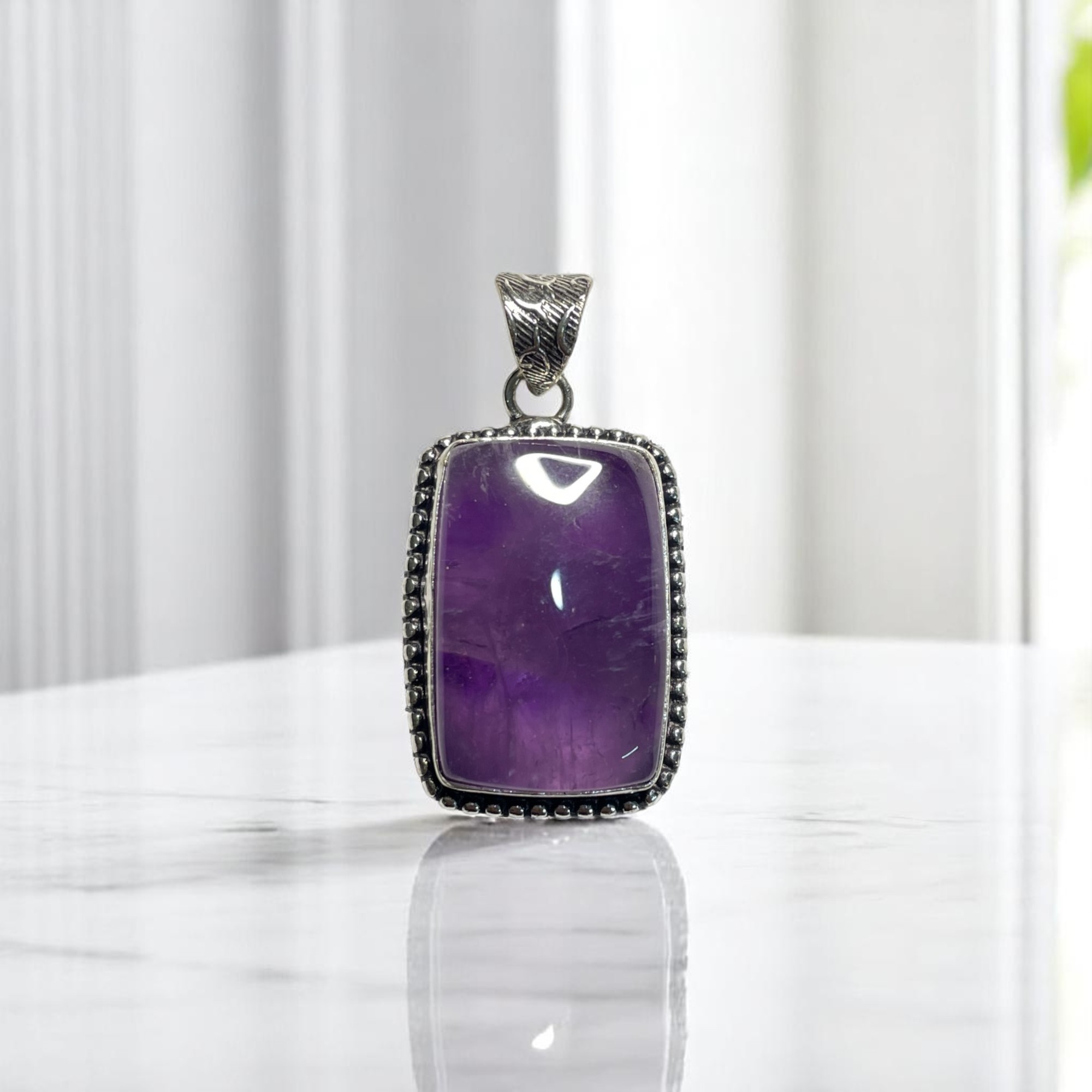 Amethyst Crystal Pendant Discover the Power of Natural Crystals with Rocksmins: Elegantly Crafted Crystal Pendant Infused with Authentic Energies for Enhanced Well-Being and Spiritual Growth