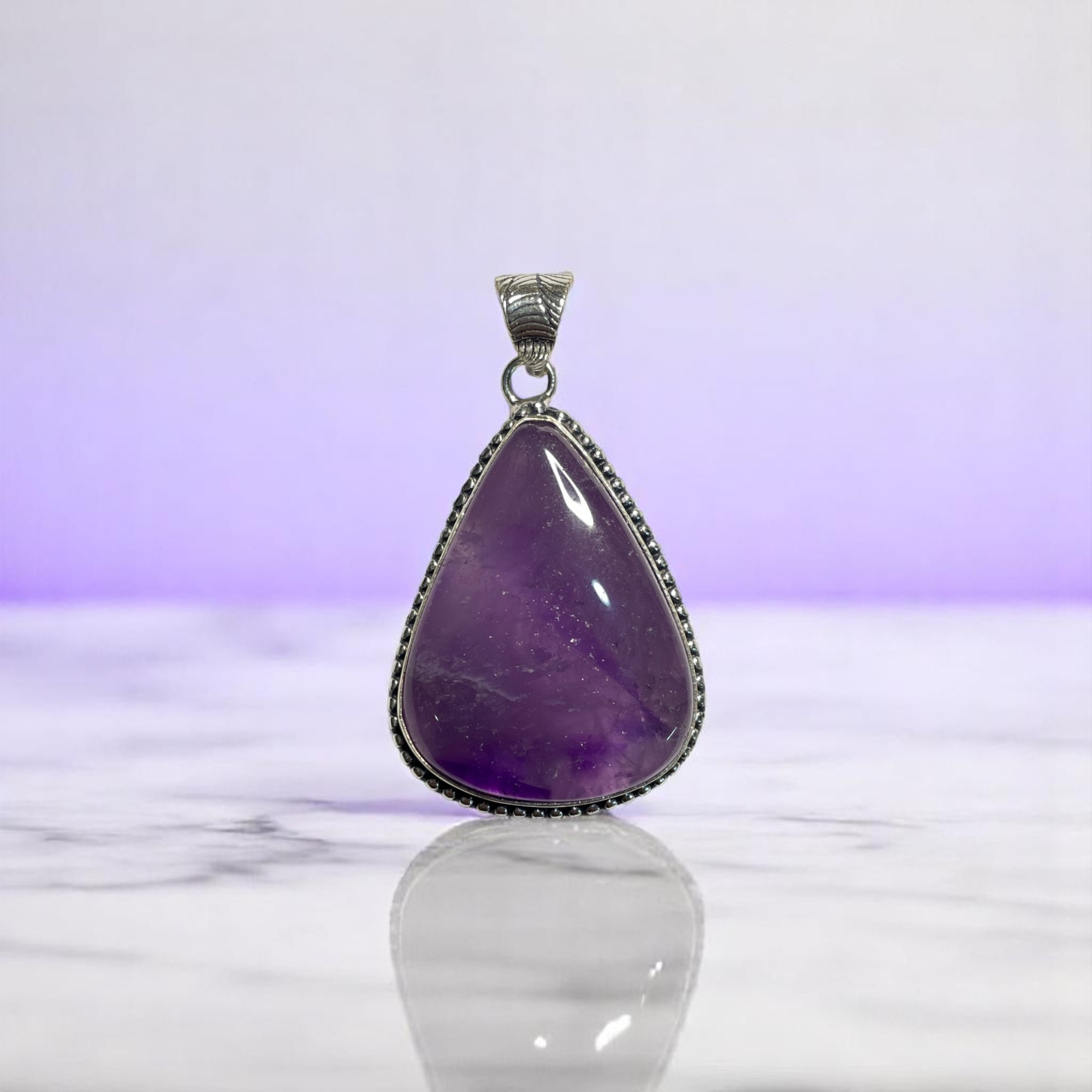 Amethyst Crystal Pendant Discover the Power of Natural Crystals with Rocksmins: Elegantly Crafted Crystal Pendant Infused with Authentic Energies for Enhanced Well-Being and Spiritual Growth
