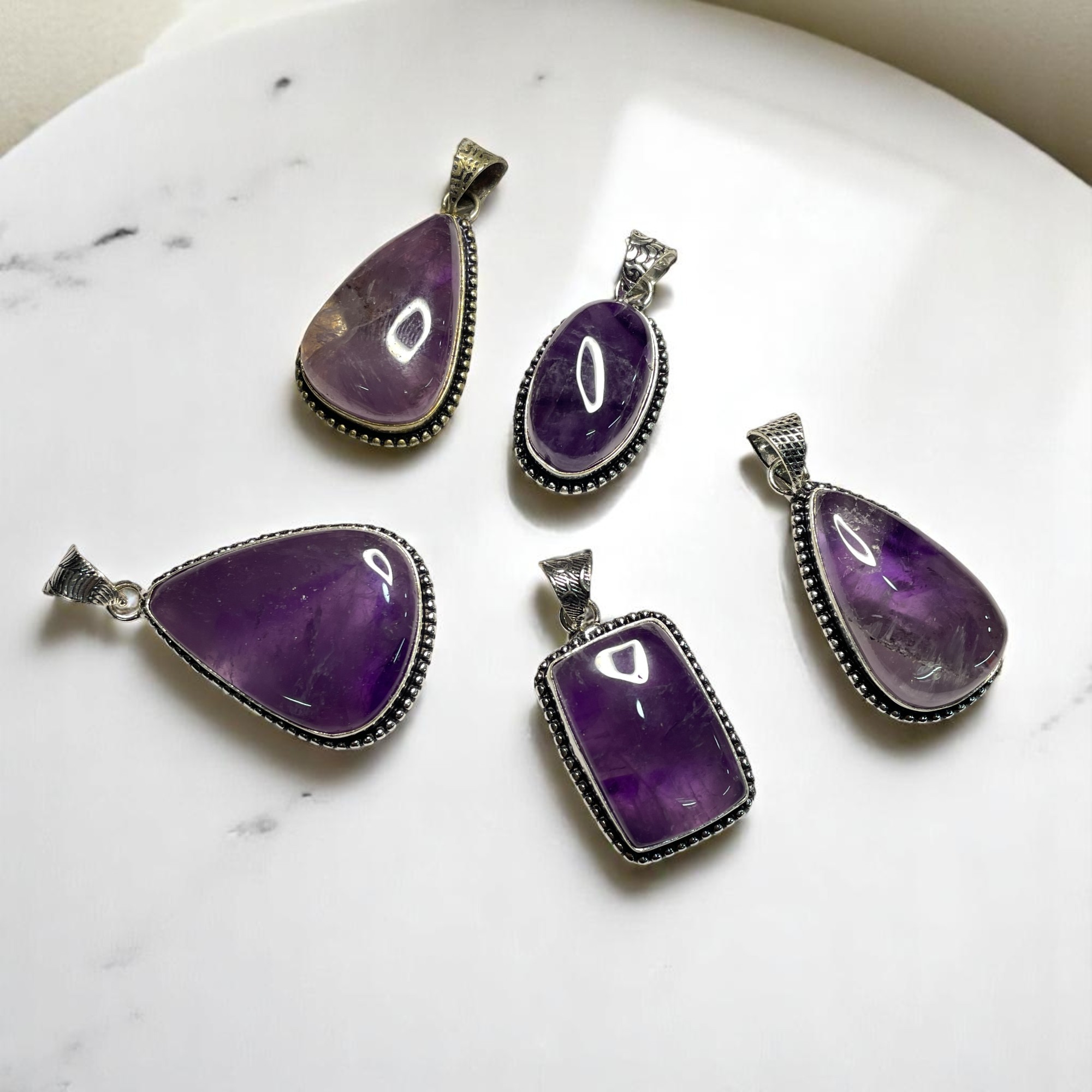 Amethyst Crystal Pendant Discover the Power of Natural Crystals with Rocksmins: Elegantly Crafted Crystal Pendant Infused with Authentic Energies for Enhanced Well-Being and Spiritual Growth
