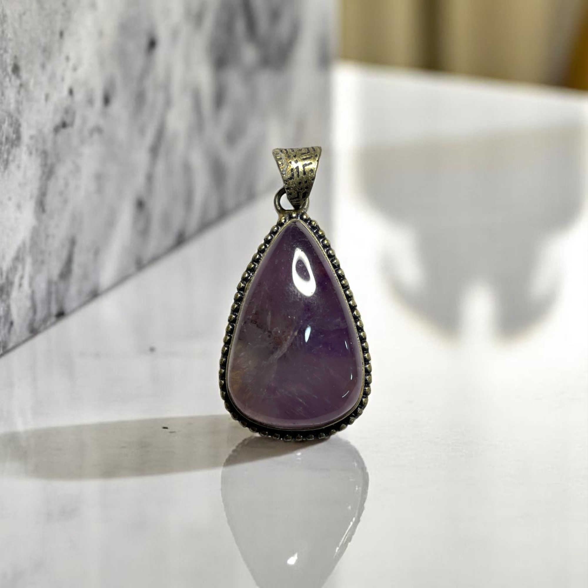 Amethyst Crystal Pendant Discover the Power of Natural Crystals with Rocksmins: Elegantly Crafted Crystal Pendant Infused with Authentic Energies for Enhanced Well-Being and Spiritual Growth