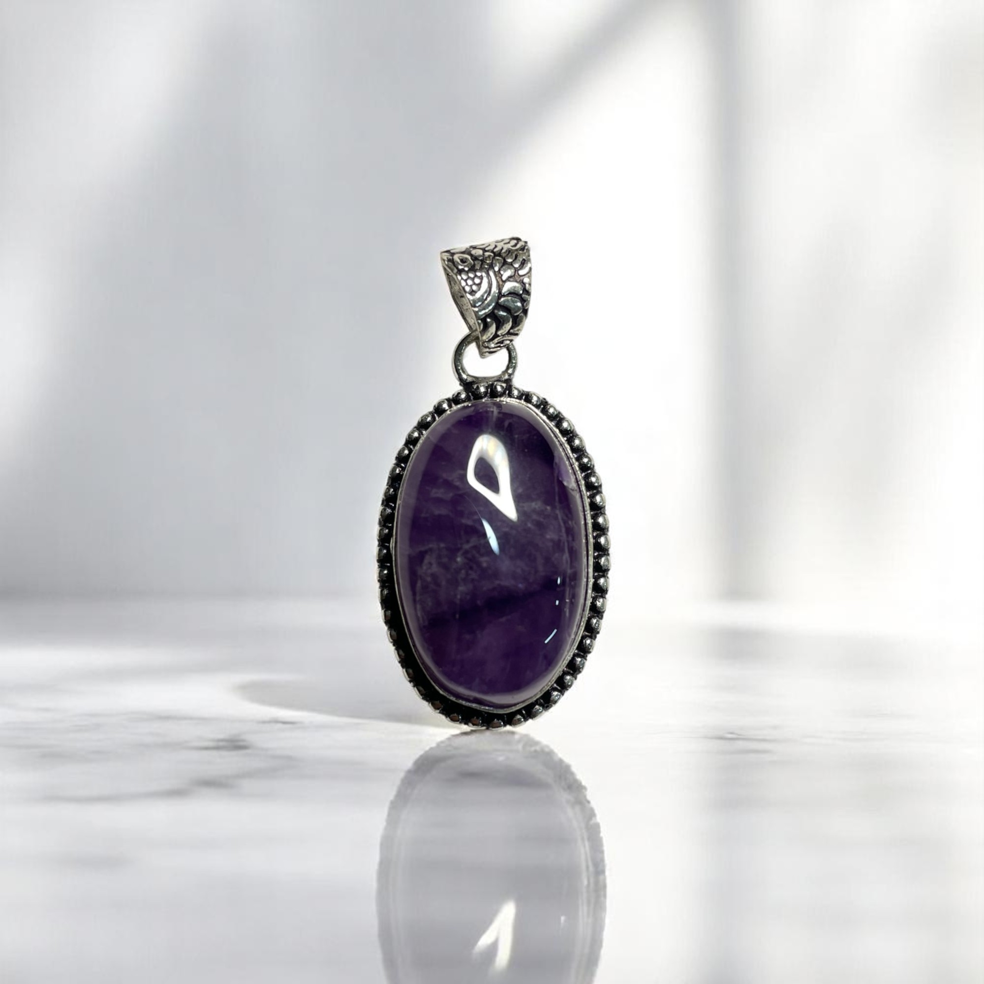 Amethyst Crystal Pendant Discover the Power of Natural Crystals with Rocksmins: Elegantly Crafted Crystal Pendant Infused with Authentic Energies for Enhanced Well-Being and Spiritual Growth