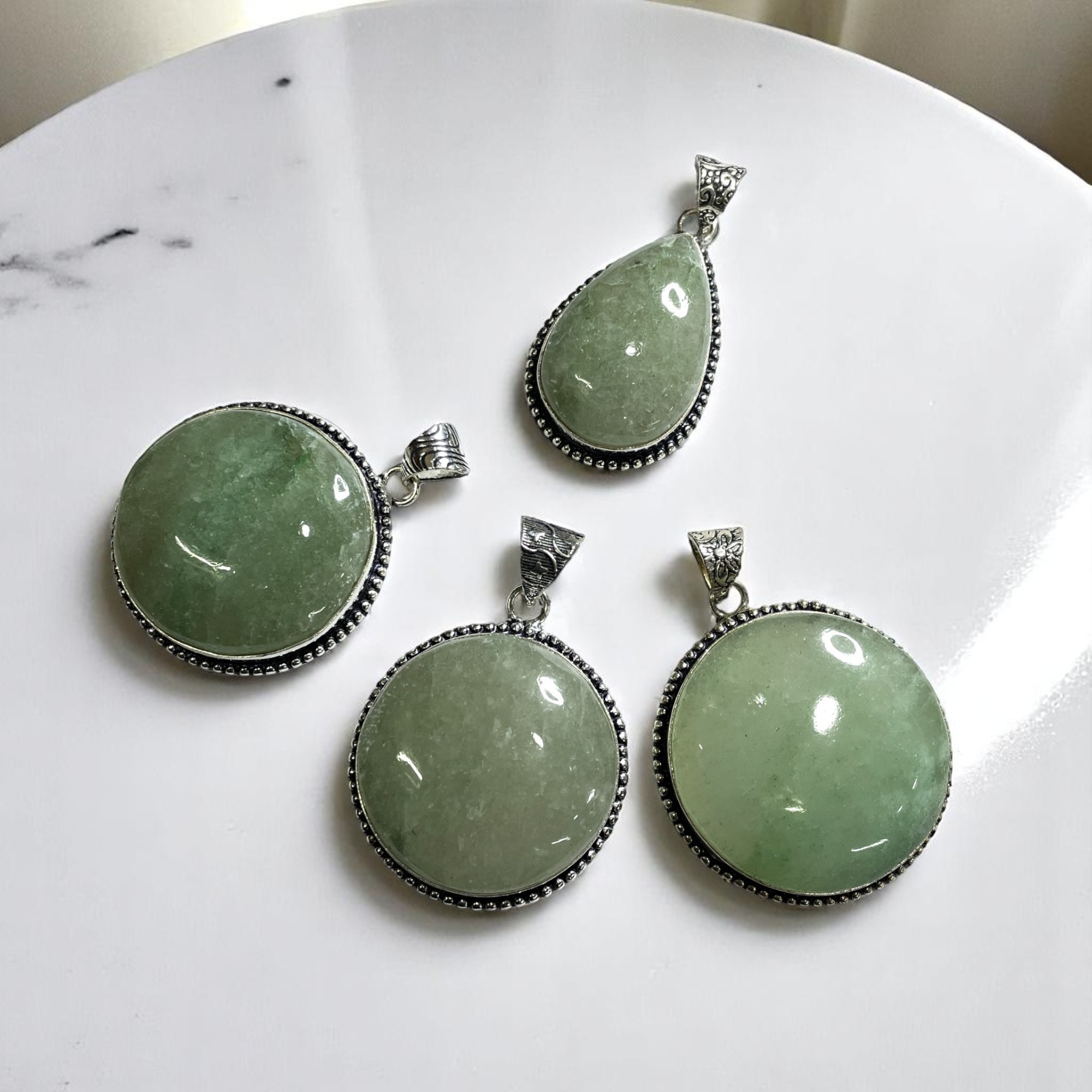 Aventurine Green Crystal Pendant Discover the Power of Natural Crystals with Rocksmins: Elegantly Crafted Crystal Pendant Infused with Authentic Energies for Enhanced Well-Being and Spiritual Growth