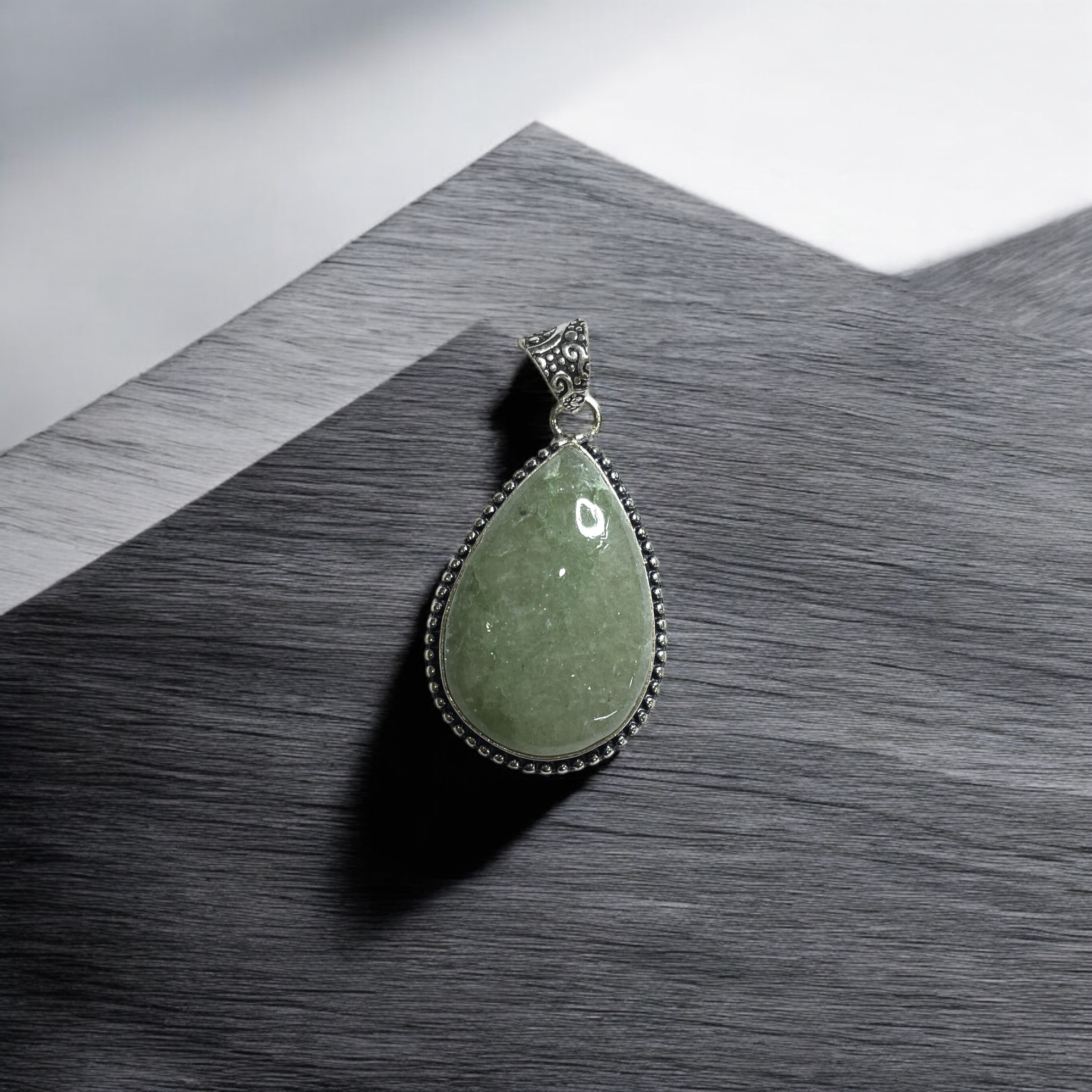 aventurine-green-crystal-pendant-discover-the-power-of-natural-crystals-with-rocksmins-elegantly-crafted-crystal-pendant-infused-with-authentic-energies-for-enhanced-well-being-and-spiritual-growth
