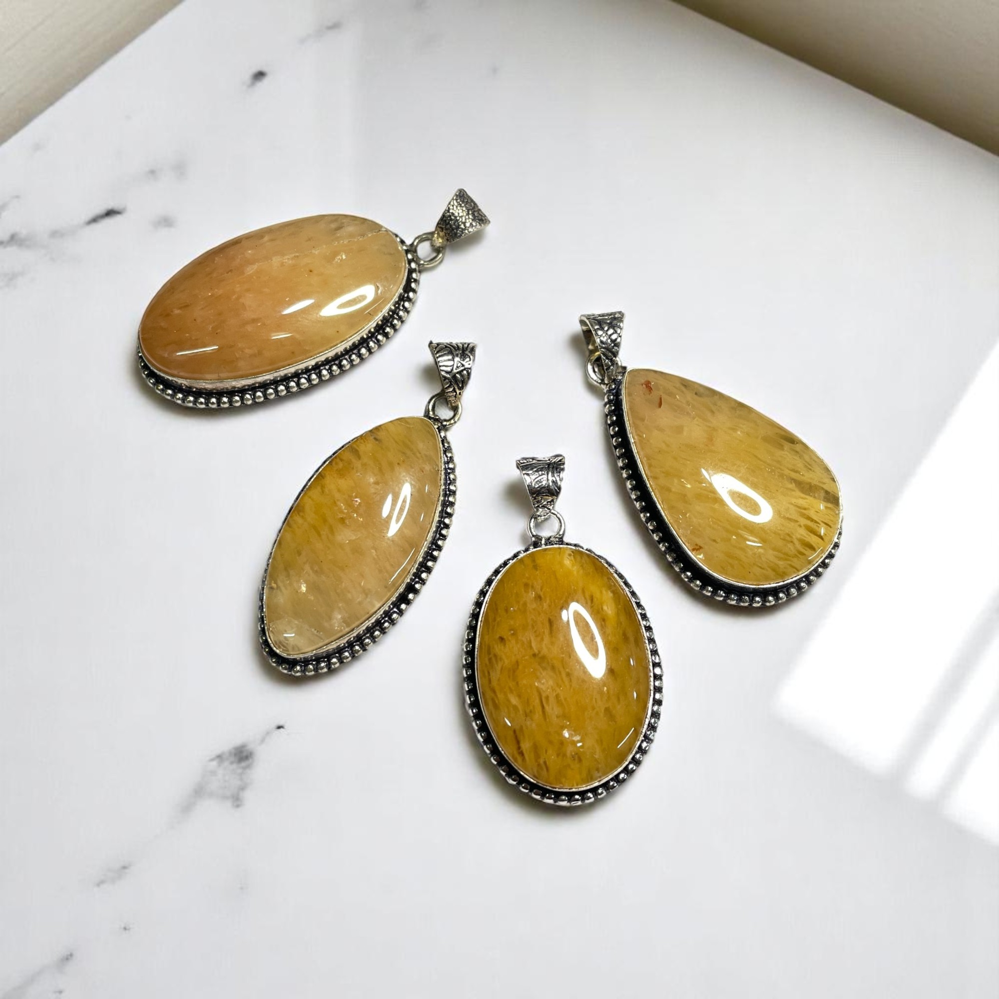 Aventurine Yellow Crystal Pendant Discover the Power of Natural Crystals with Rocksmins: Elegantly Crafted Crystal Pendant Infused with Authentic Energies for Enhanced Well-Being and Spiritual Growth