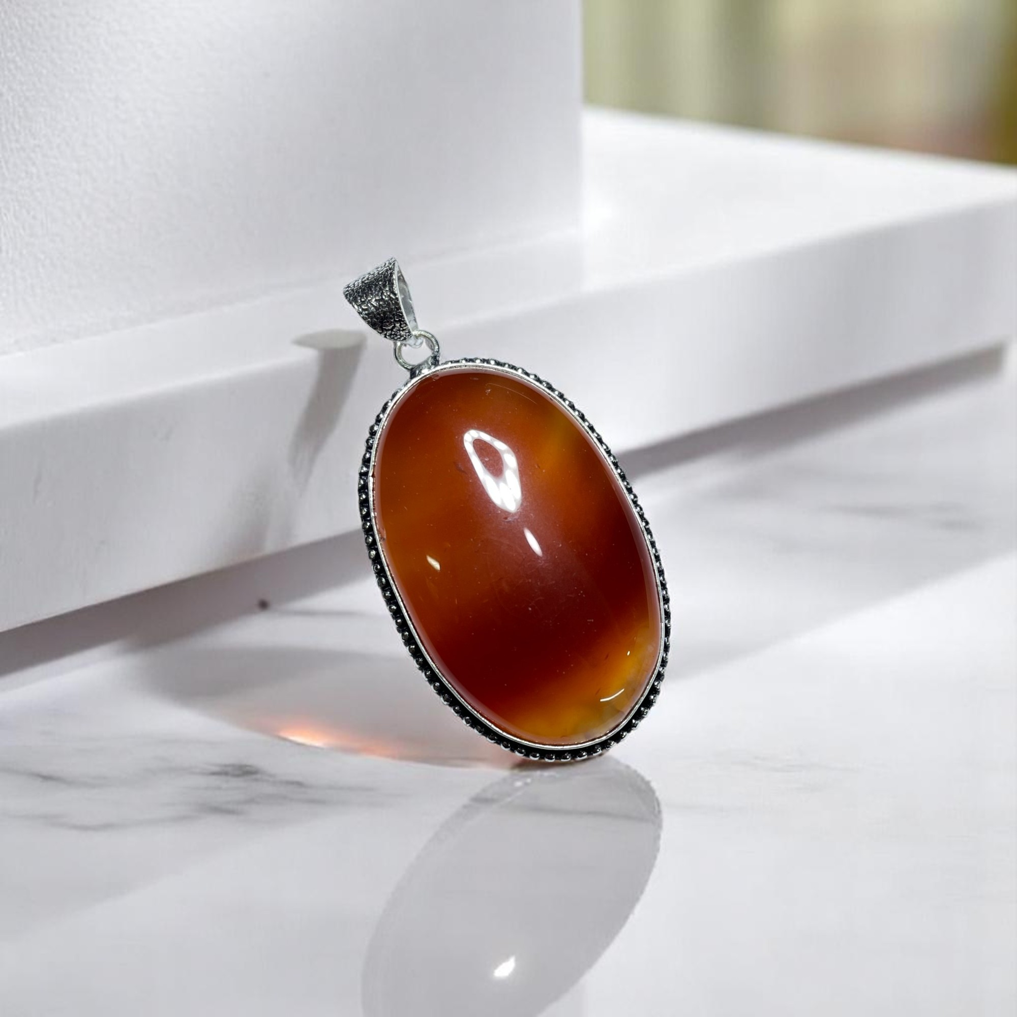 Carnelian Crystal Pendant Discover the Power of Natural Crystals with Rocksmins: Elegantly Crafted Crystal Pendant Infused with Authentic Energies for Enhanced Well-Being and Spiritual Growth