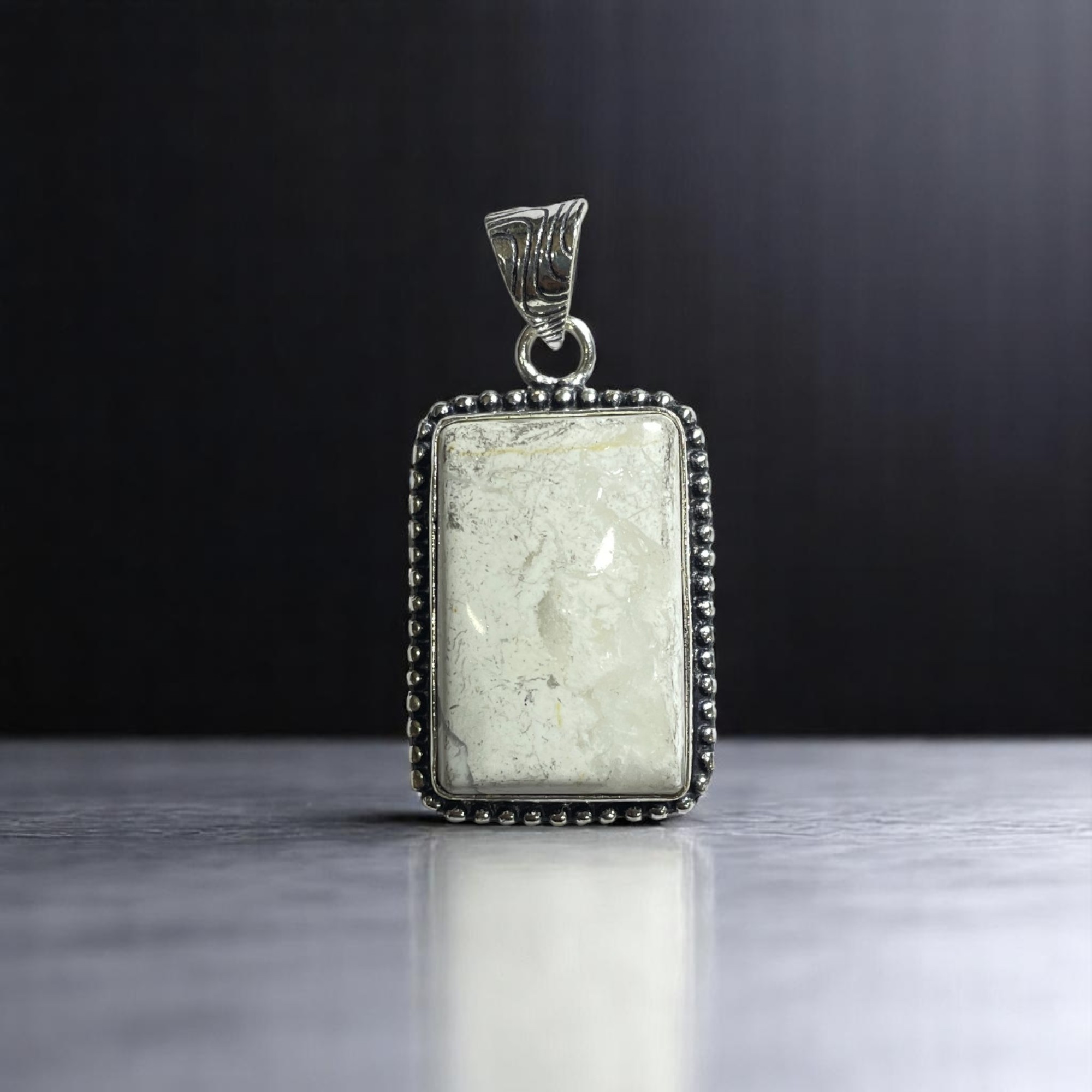 Howlite Crystal Pendant Discover the Power of Natural Crystals with Rocksmins. Elegantly Crafted Crystal Pendant Infused with Authentic Energies for Enhanced Well-Being and Spiritual Growth