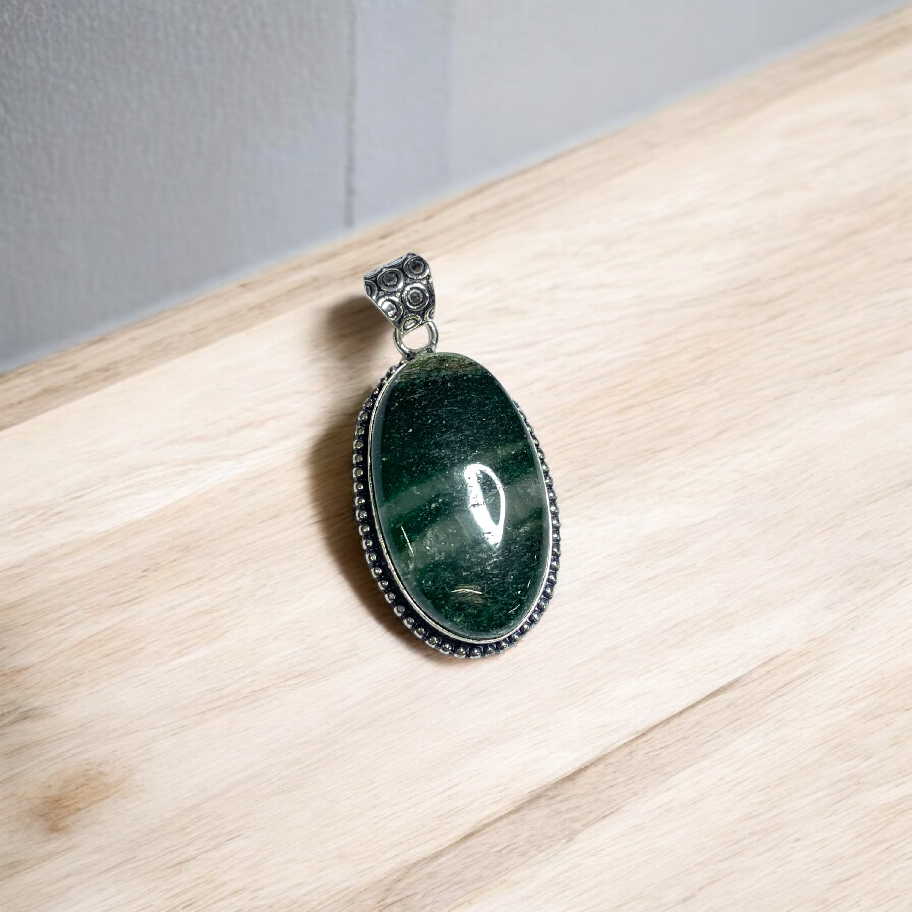 green-jade-crystal-pendant-discover-the-power-of-natural-crystals-with-rocksmins-elegantly-crafted-crystal-pendant-infused-with-authentic-energies-for-enhanced-well-being-and-spiritual-growth