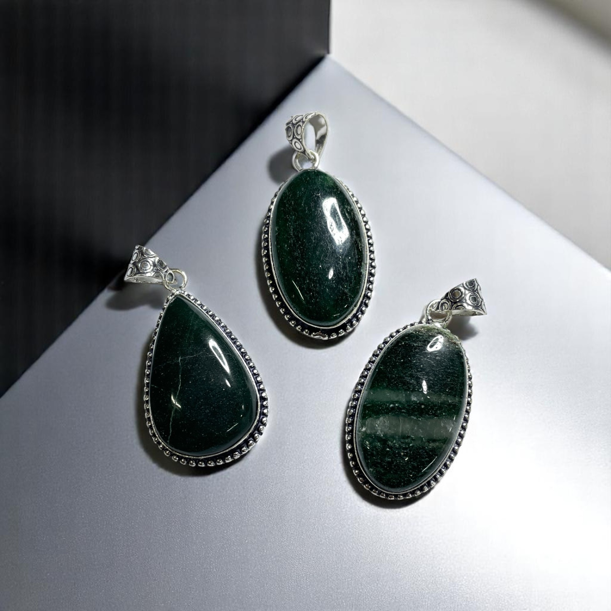 Green Jade Crystal Pendant Discover the Power of Natural Crystals with Rocksmins. Elegantly Crafted Crystal Pendant Infused with Authentic Energies for Enhanced Well-Being and Spiritual Growth