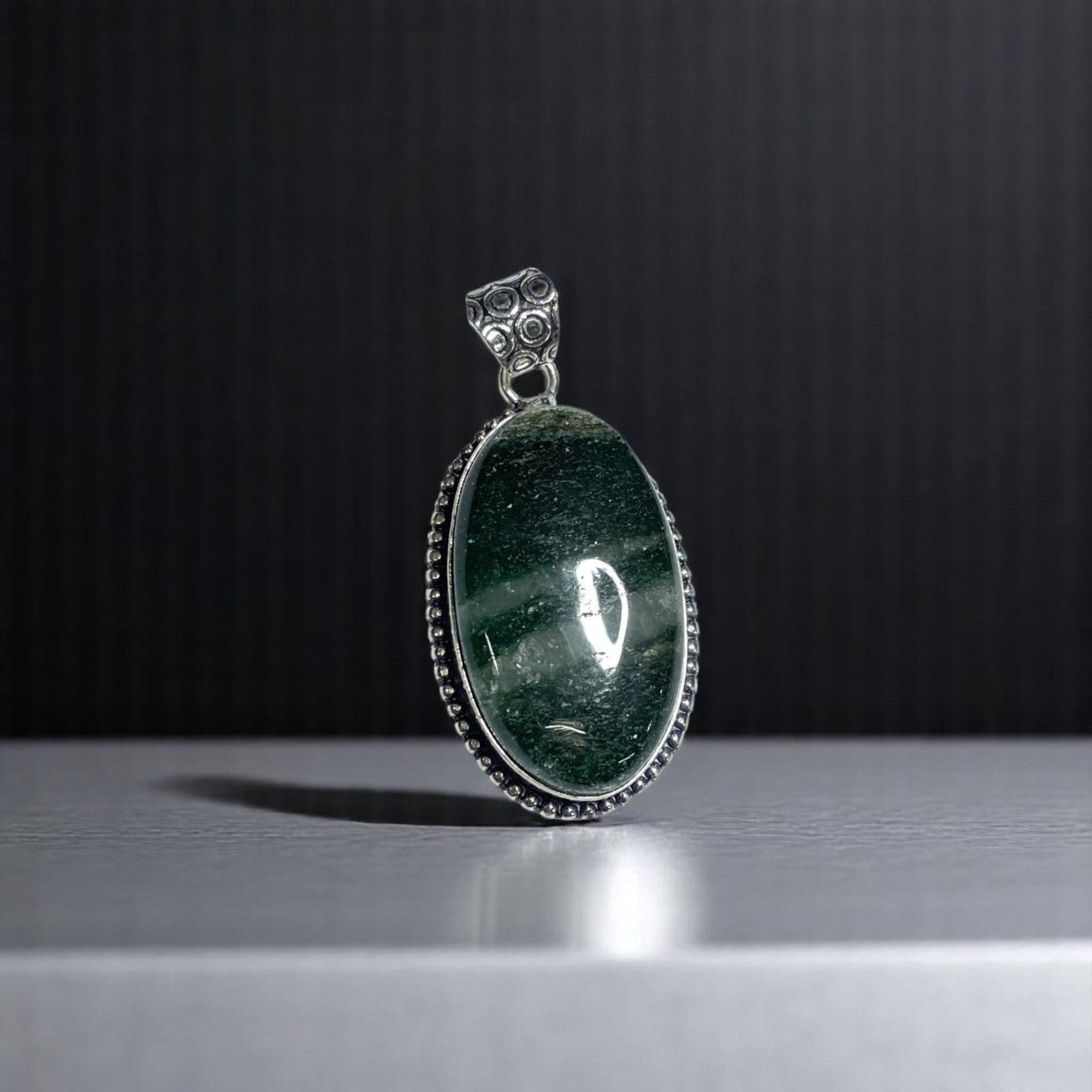 Green Jade Crystal Pendant Discover the Power of Natural Crystals with Rocksmins. Elegantly Crafted Crystal Pendant Infused with Authentic Energies for Enhanced Well-Being and Spiritual Growth