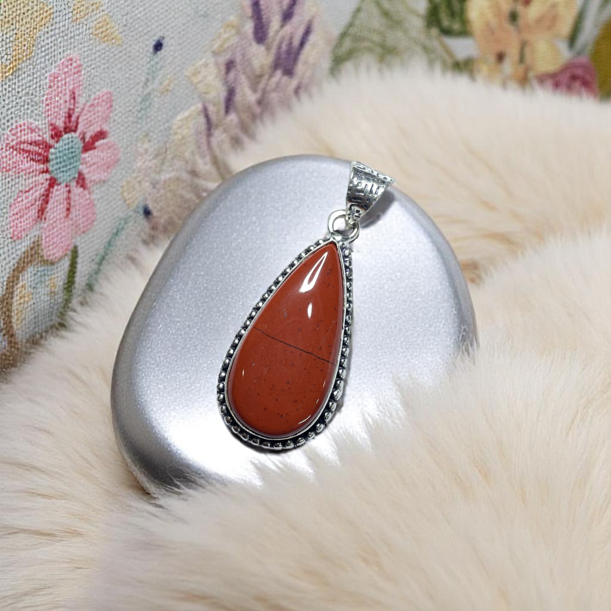 Jasper Red Crystal Pendant Discover the Power of Natural Crystals with Rocksmins. Elegantly Crafted Crystal Pendant Infused with Authentic Energies for Enhanced Well-Being and Spiritual Growth