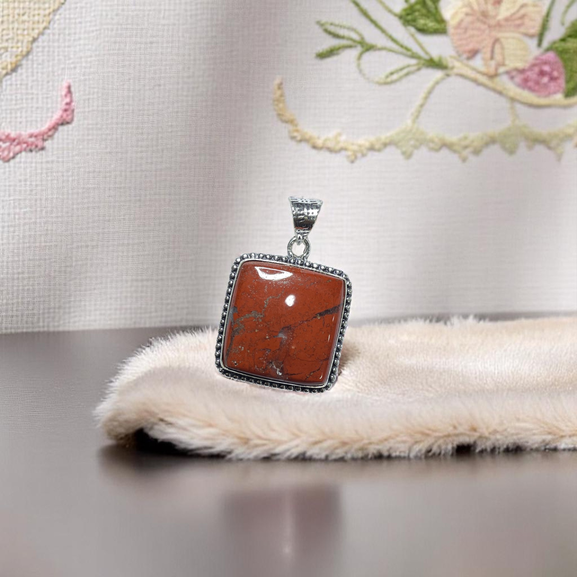 Jasper Red Crystal Pendant Discover the Power of Natural Crystals with Rocksmins. Elegantly Crafted Crystal Pendant Infused with Authentic Energies for Enhanced Well-Being and Spiritual Growth
