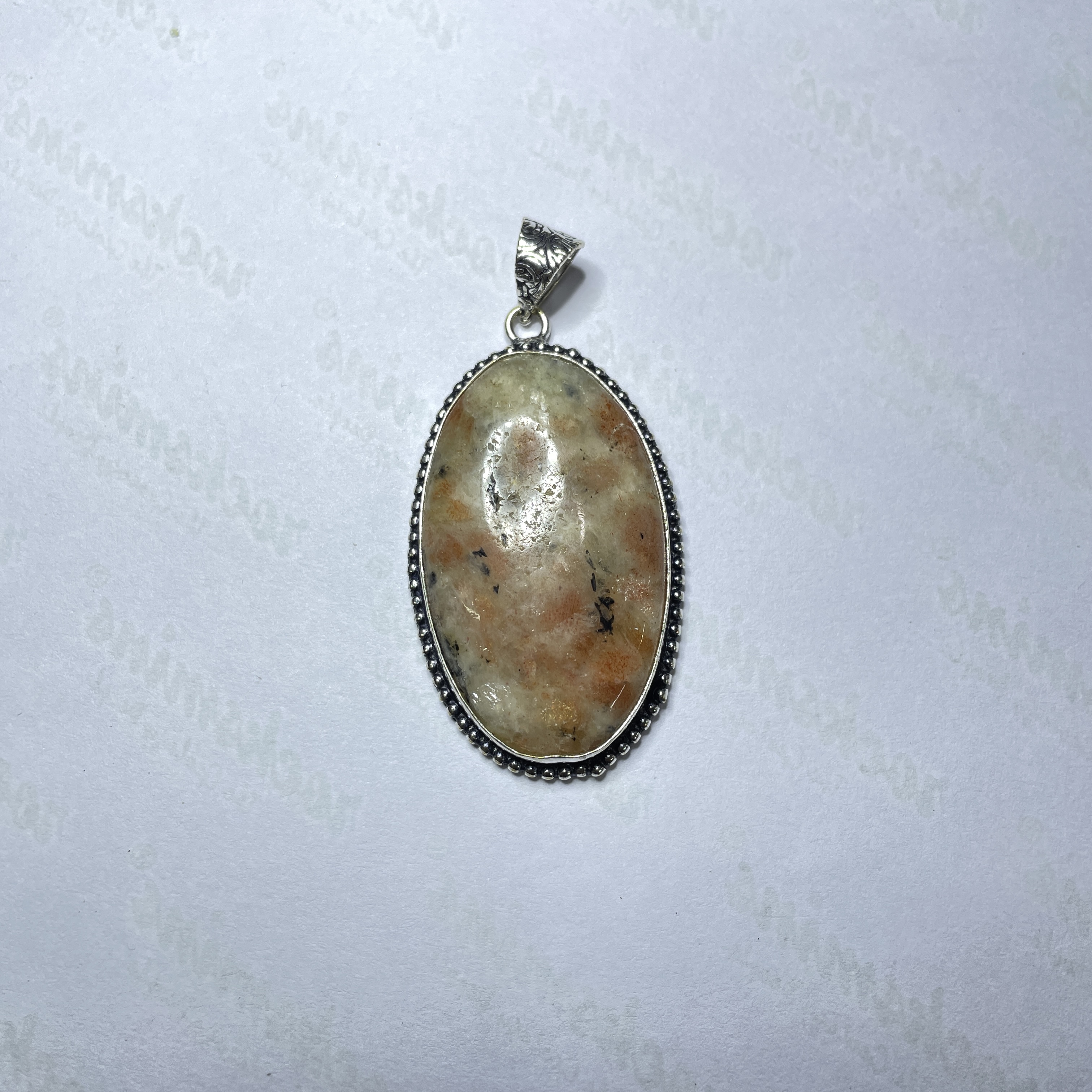 Sunstone Crystal Pendant Discover the Power of Natural Crystals with Rocksmins. Elegantly Crafted Crystal Pendant Infused with Authentic Energies for Enhanced Well-Being and Spiritual Growth