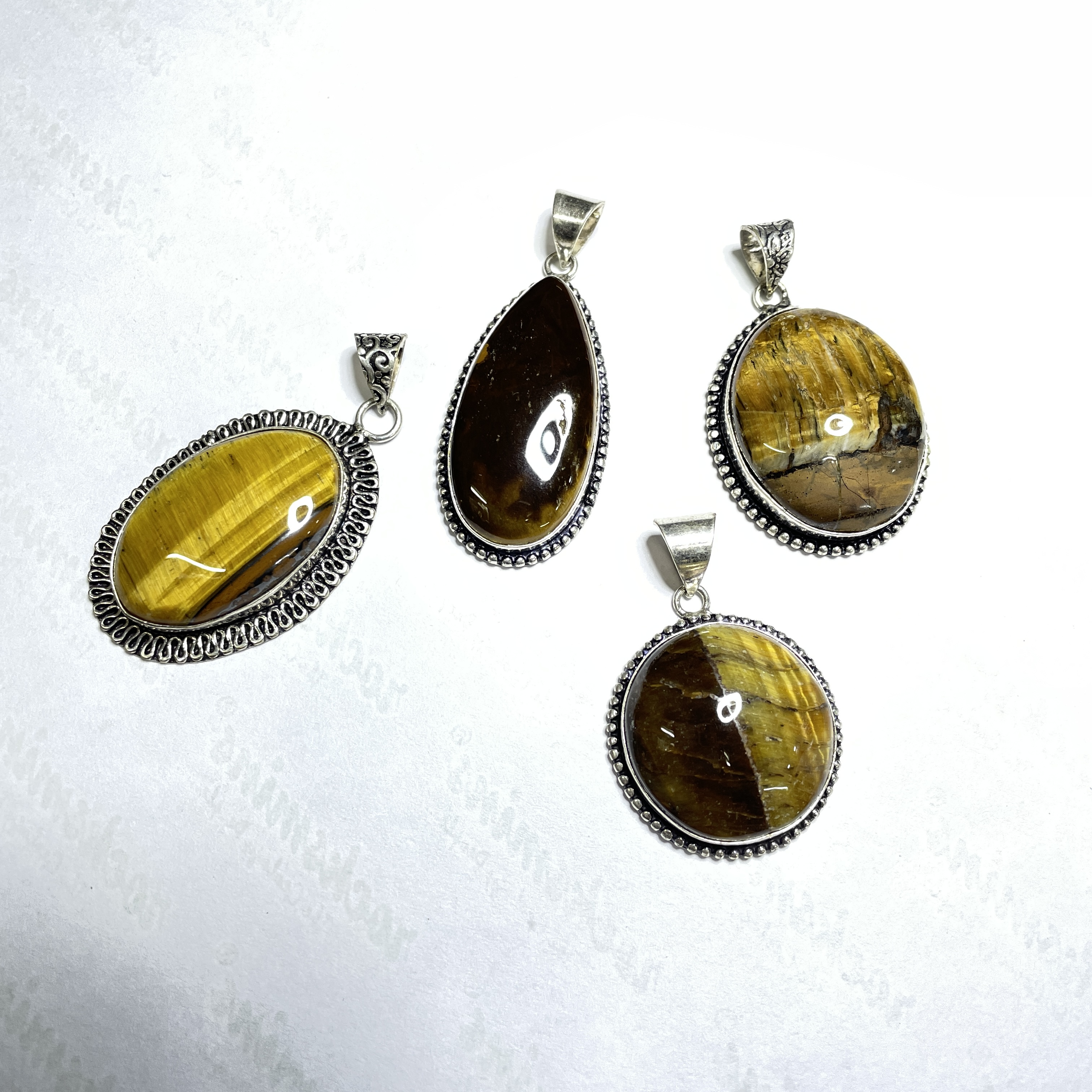 Tiger eye Yellow Crystal Pendant Discover the Power of Natural Crystals with Rocksmins. Elegantly Crafted Crystal Pendant Infused with Authentic Energies for Enhanced Well-Being and Spiritual Growth