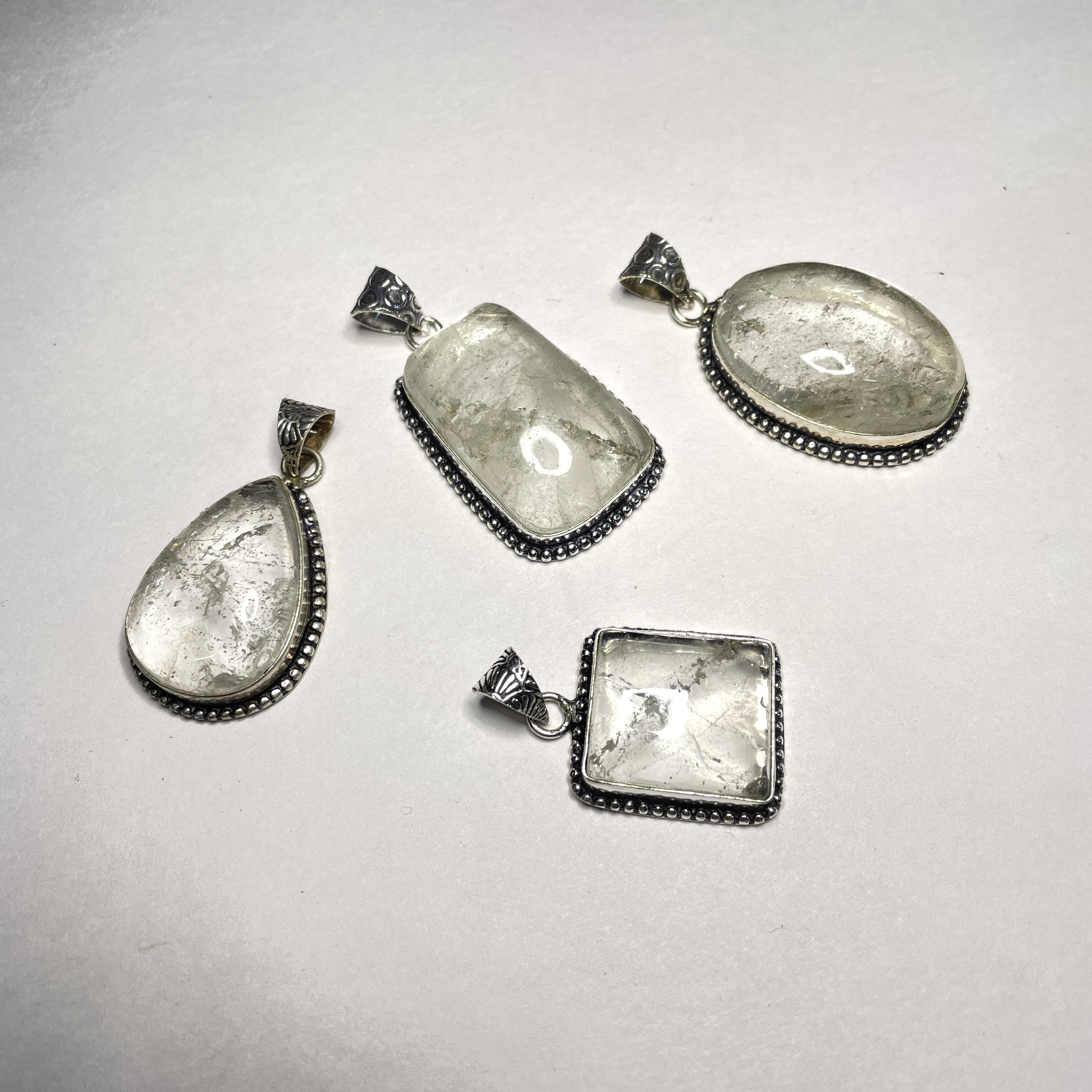 Quartz Clear Sphatik Crystal Pendant Discover the Power of Natural Crystals with Rocksmins. Elegantly Crafted Crystal Pendant Infused with Authentic Energies for Enhanced Well-Being and Spiritual Growth