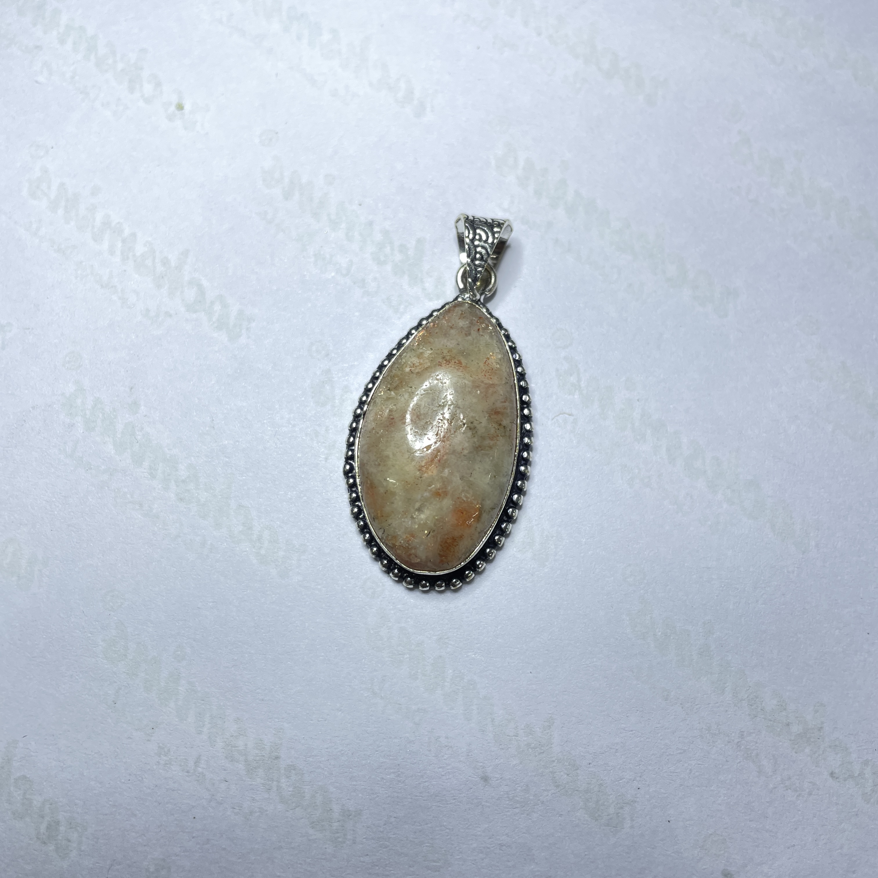 Sunstone Crystal Pendant Discover the Power of Natural Crystals with Rocksmins. Elegantly Crafted Crystal Pendant Infused with Authentic Energies for Enhanced Well-Being and Spiritual Growth