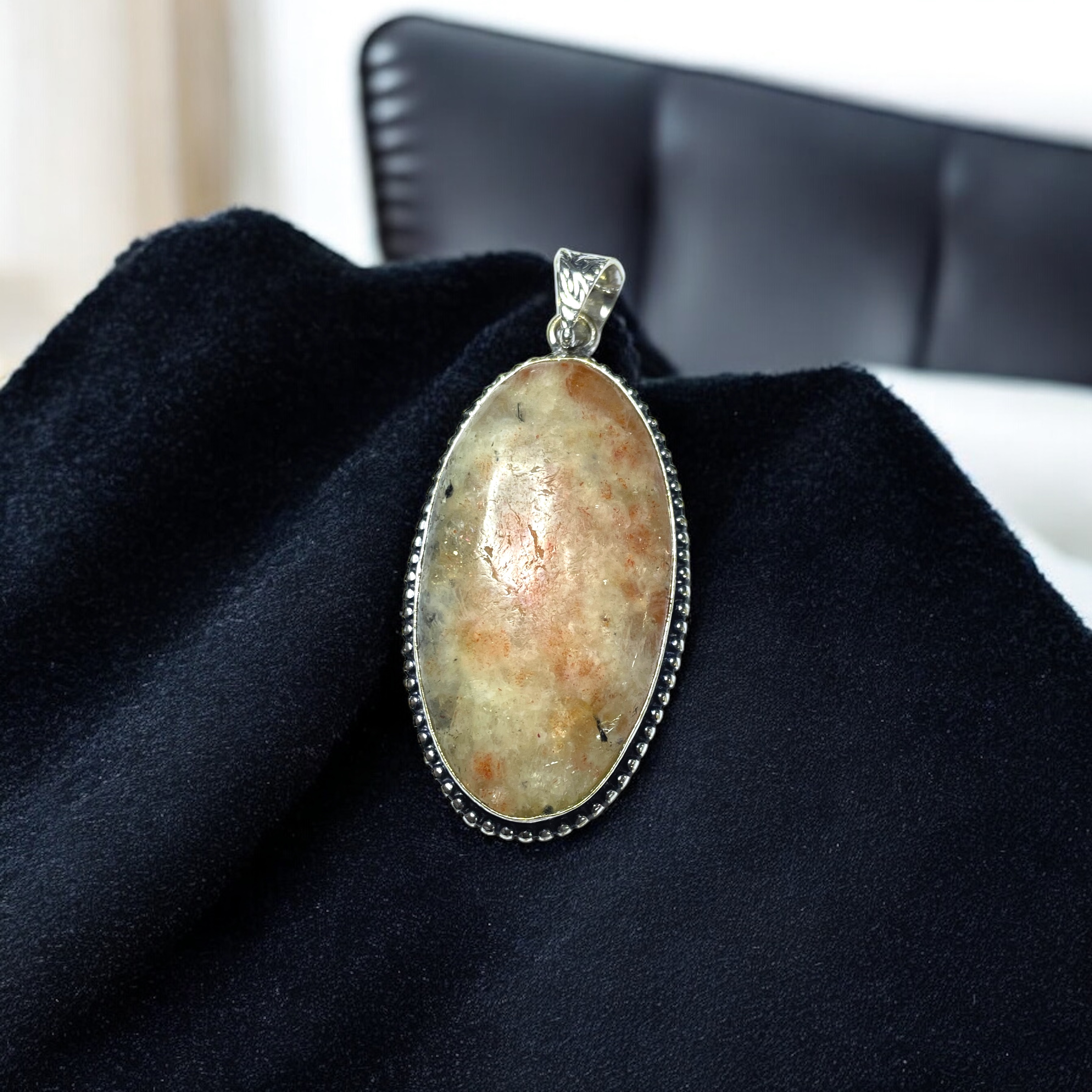 sunstone-crystal-pendant-discover-the-power-of-natural-crystals-with-rocksmins-elegantly-crafted-crystal-pendant-infused-with-authentic-energies-for-enhanced-well-being-and-spiritual-growth