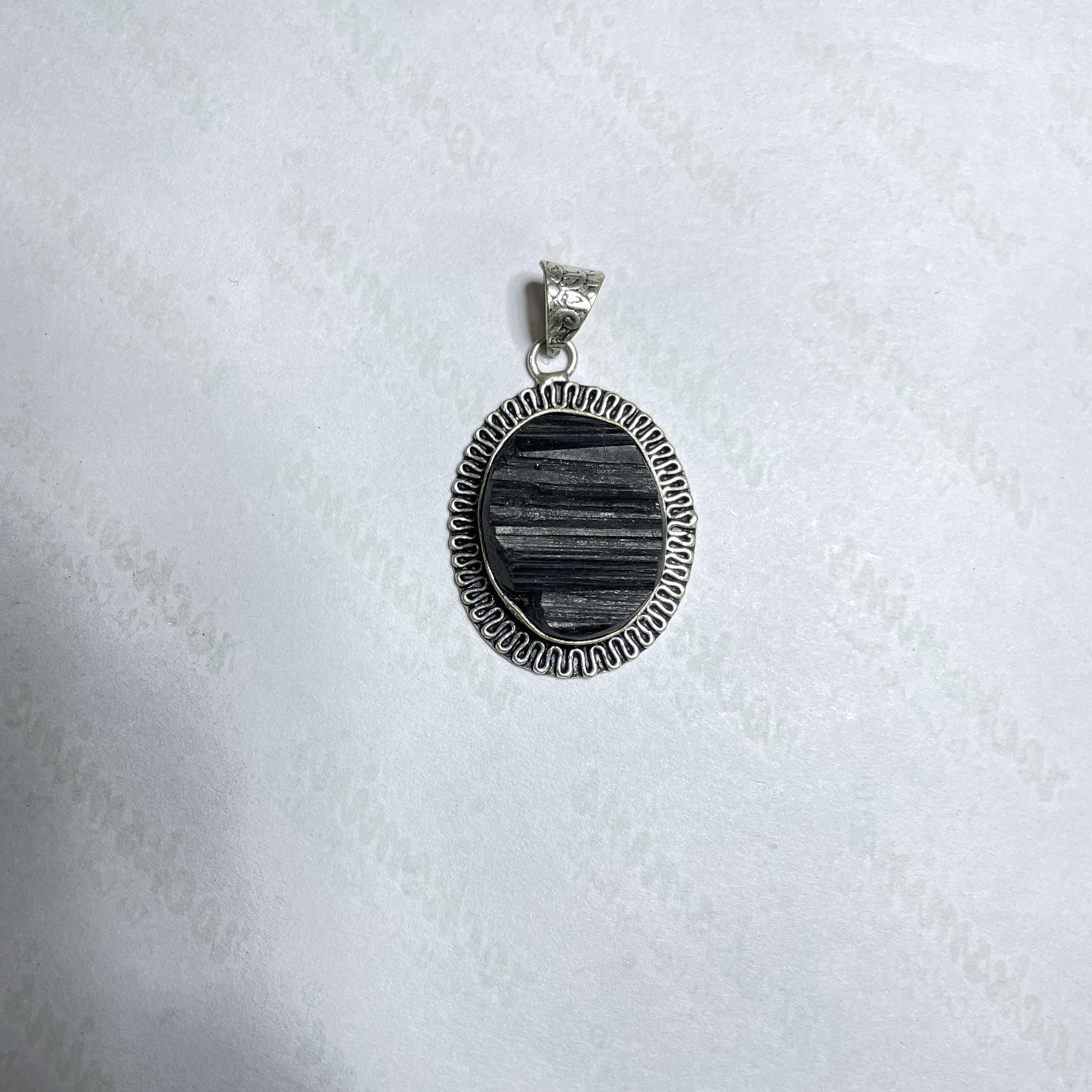 Tourmaline Black Crystal Pendant Discover the Power of Natural Crystals with Rocksmins. Elegantly Crafted Crystal Pendant Infused with Authentic Energies for Enhanced Well-Being and Spiritual Growth